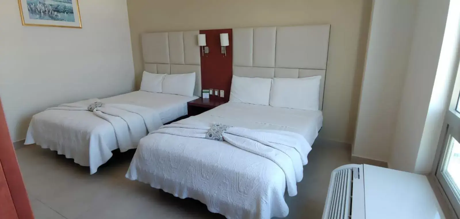 Bed in Hotel Ave Inn