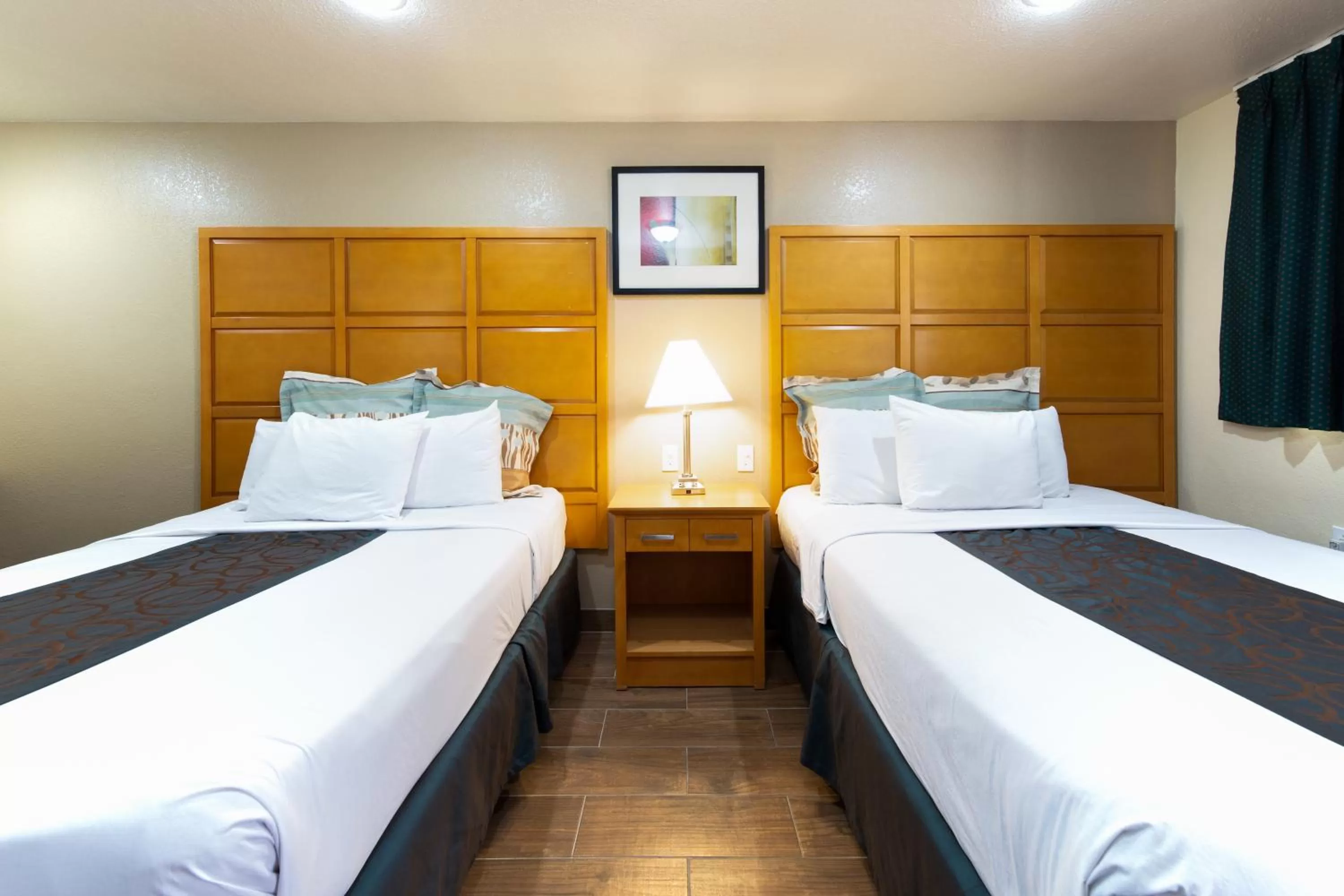 Bed in Travel Lodge by Wyndham Merced Yosemite