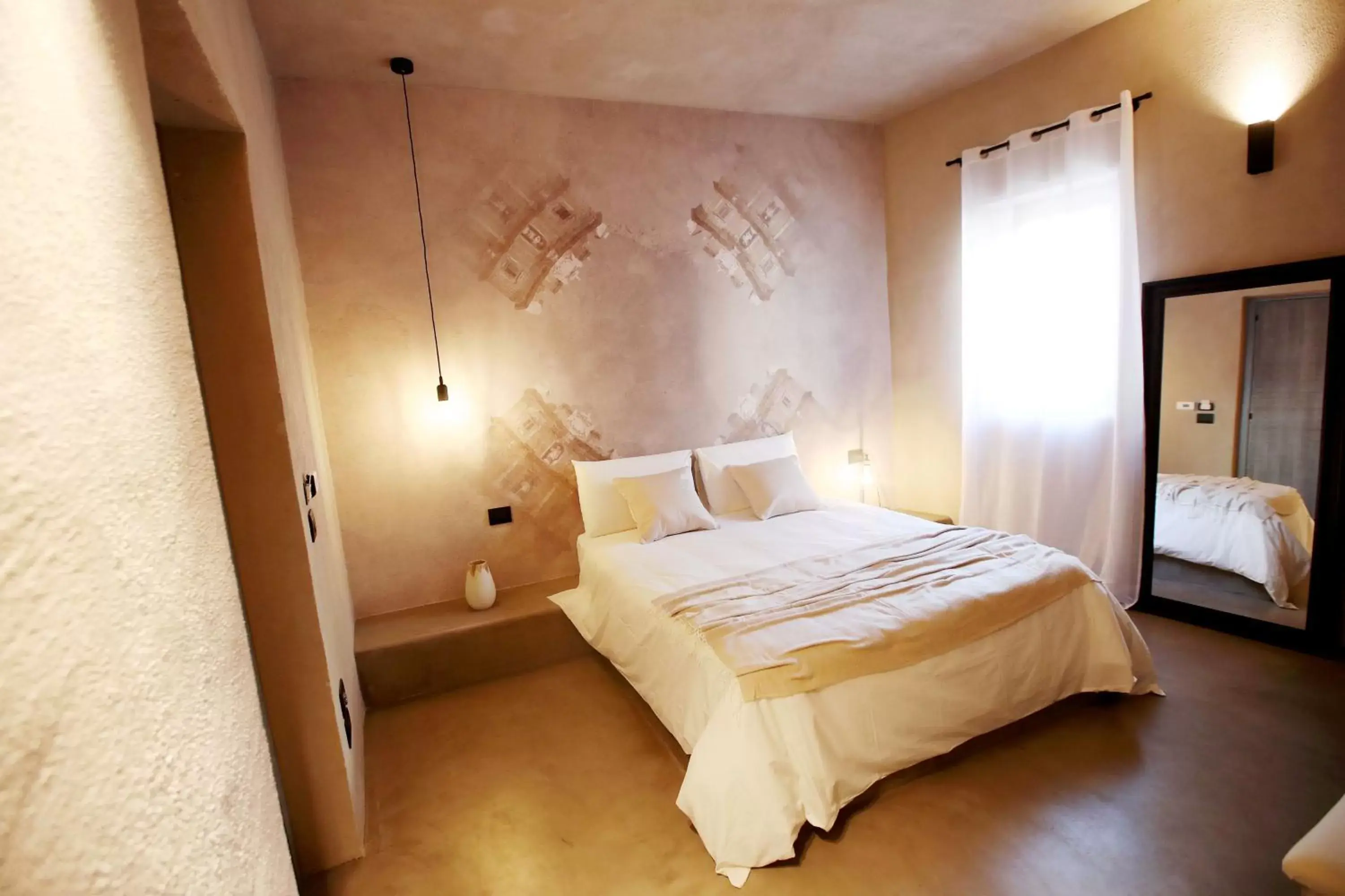 Bed in Casa Nostra Luxury Suites