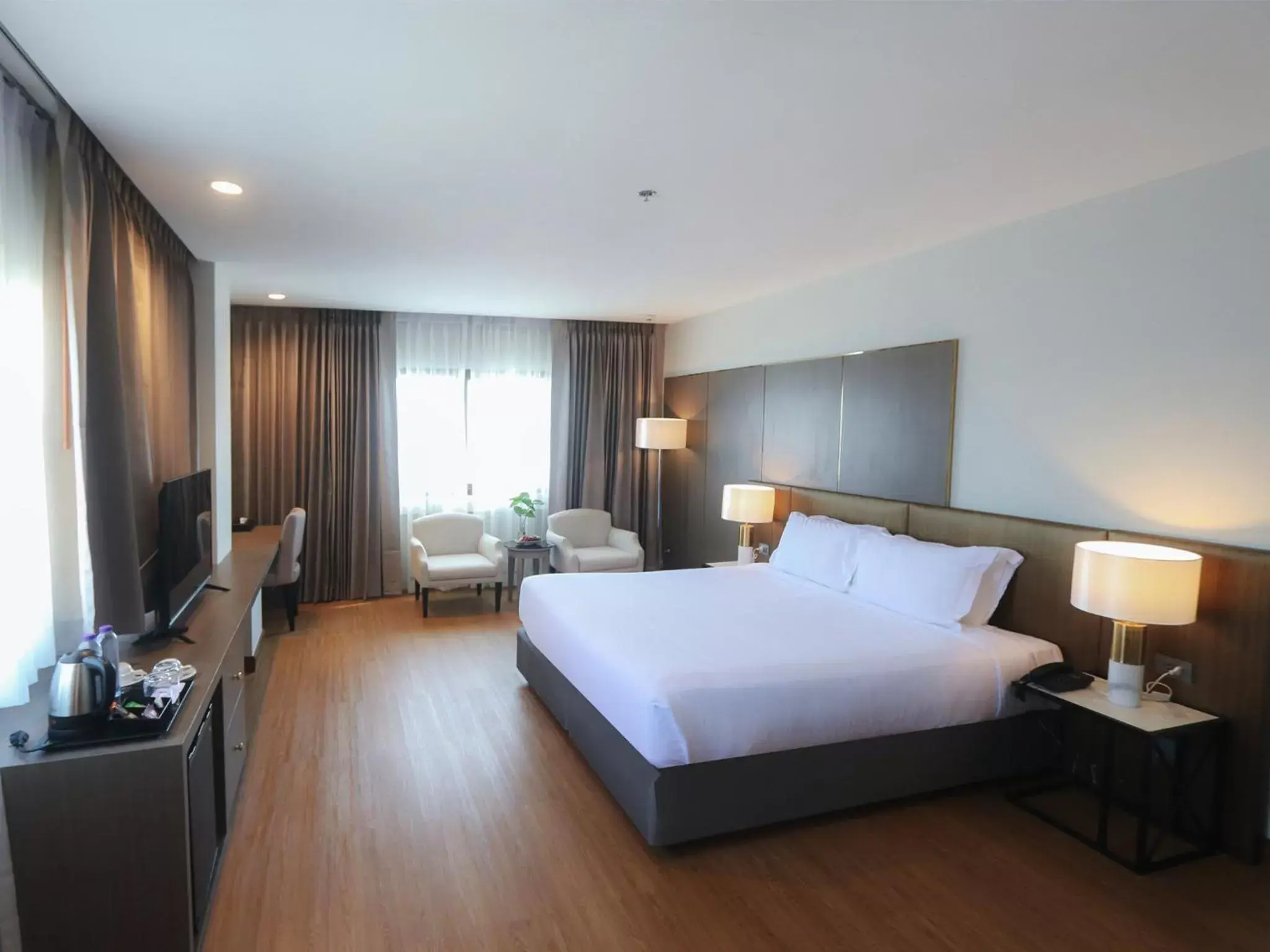 Photo of the whole room in Fortune River View Hotel Nakhon Phanom