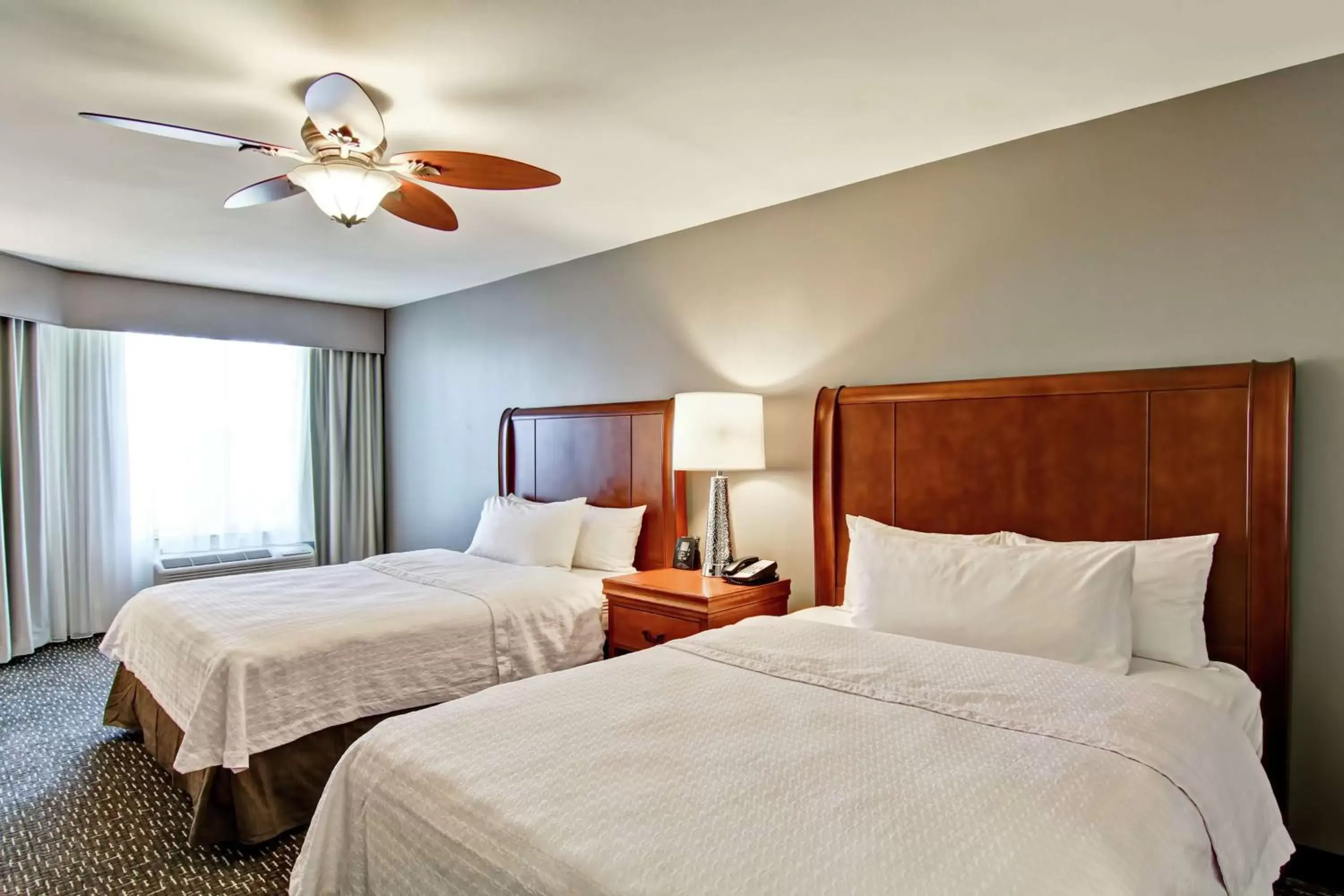 Bed in Homewood Suites by Hilton Bentonville-Rogers