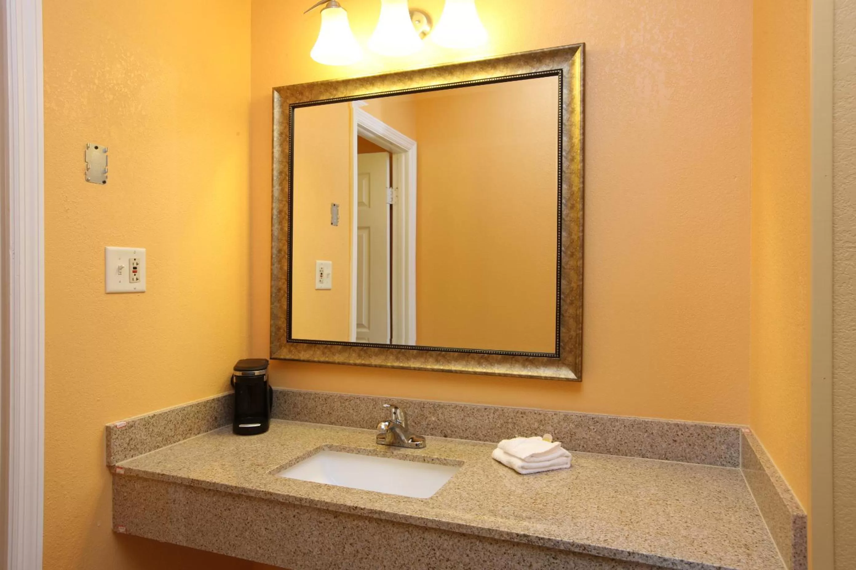 Bathroom in Days Inn by Wyndham Queensbury/Lake George