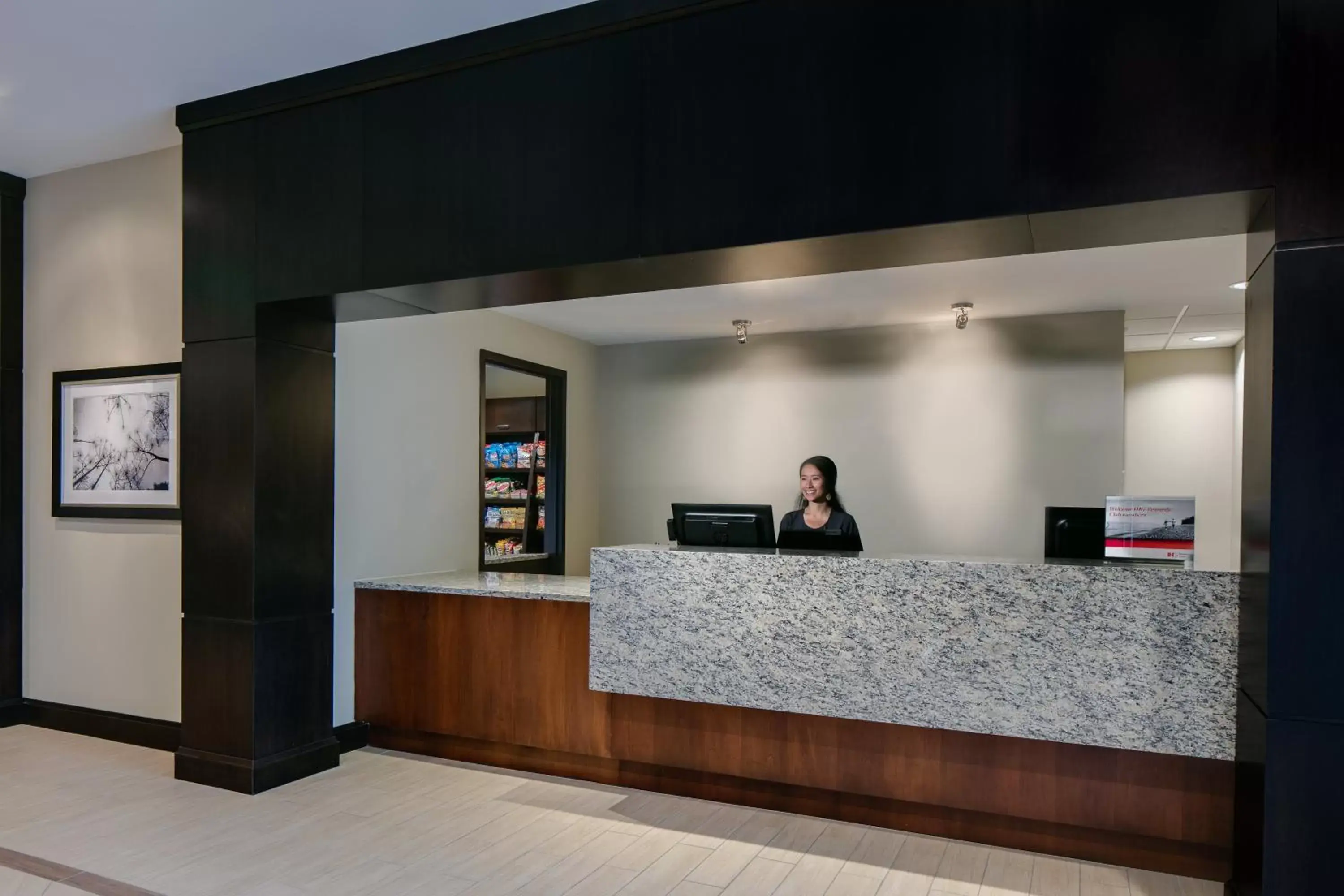 Property building, Lobby/Reception in Staybridge Suites Des Moines Downtown, an IHG Hotel