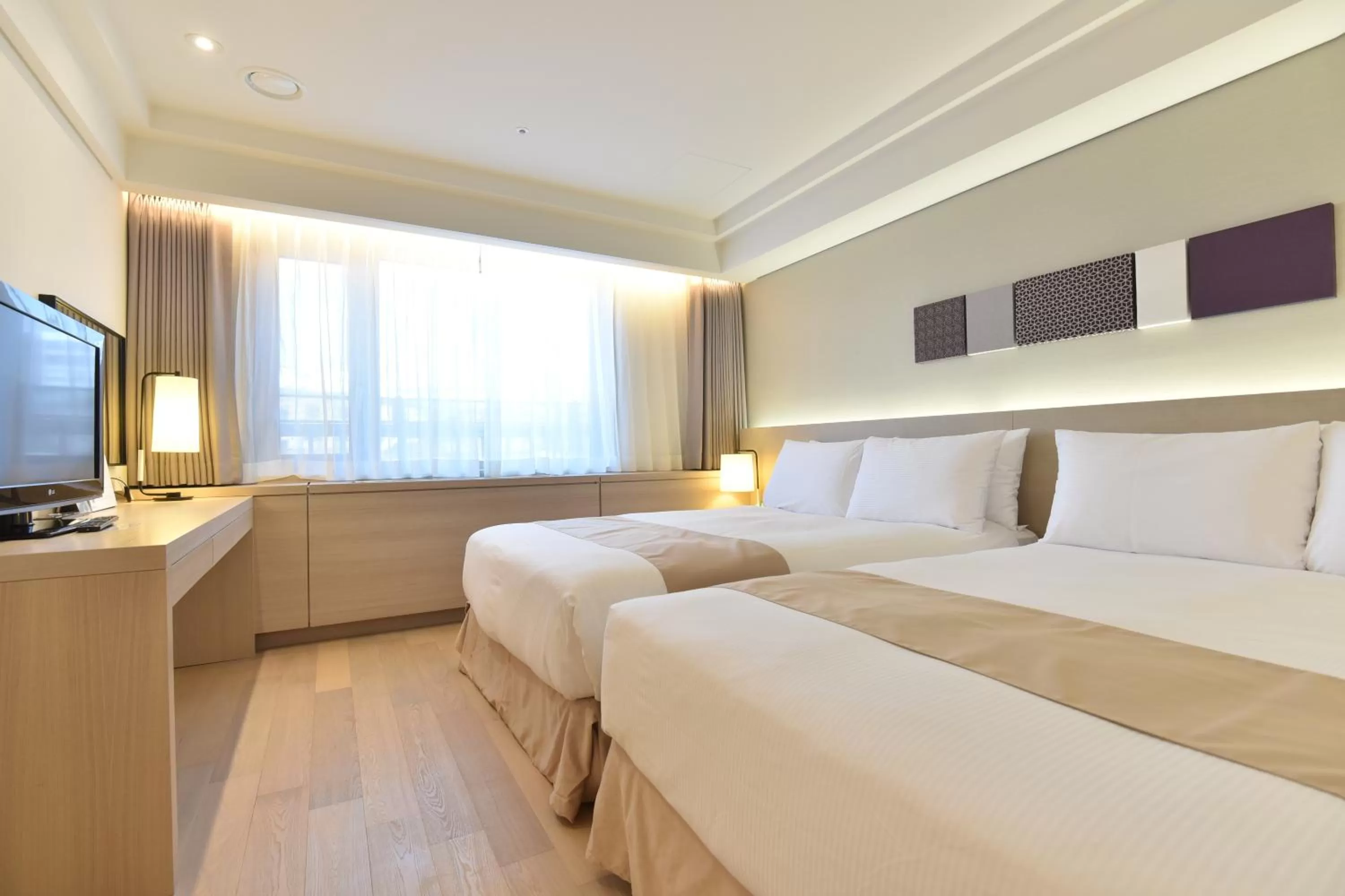 Bed in Pacific Hotel