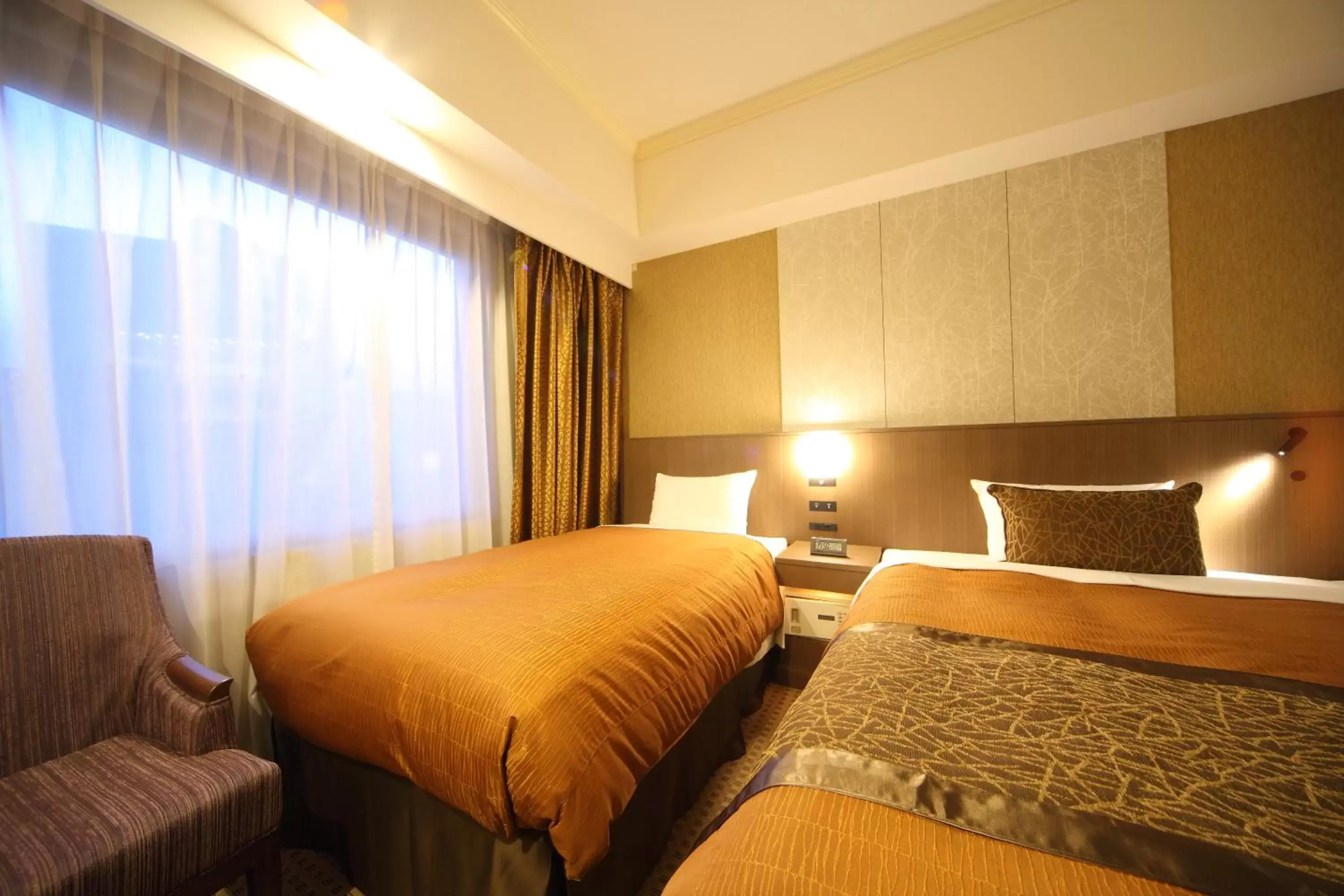 Bed in Hotel Metropolitan Nagano