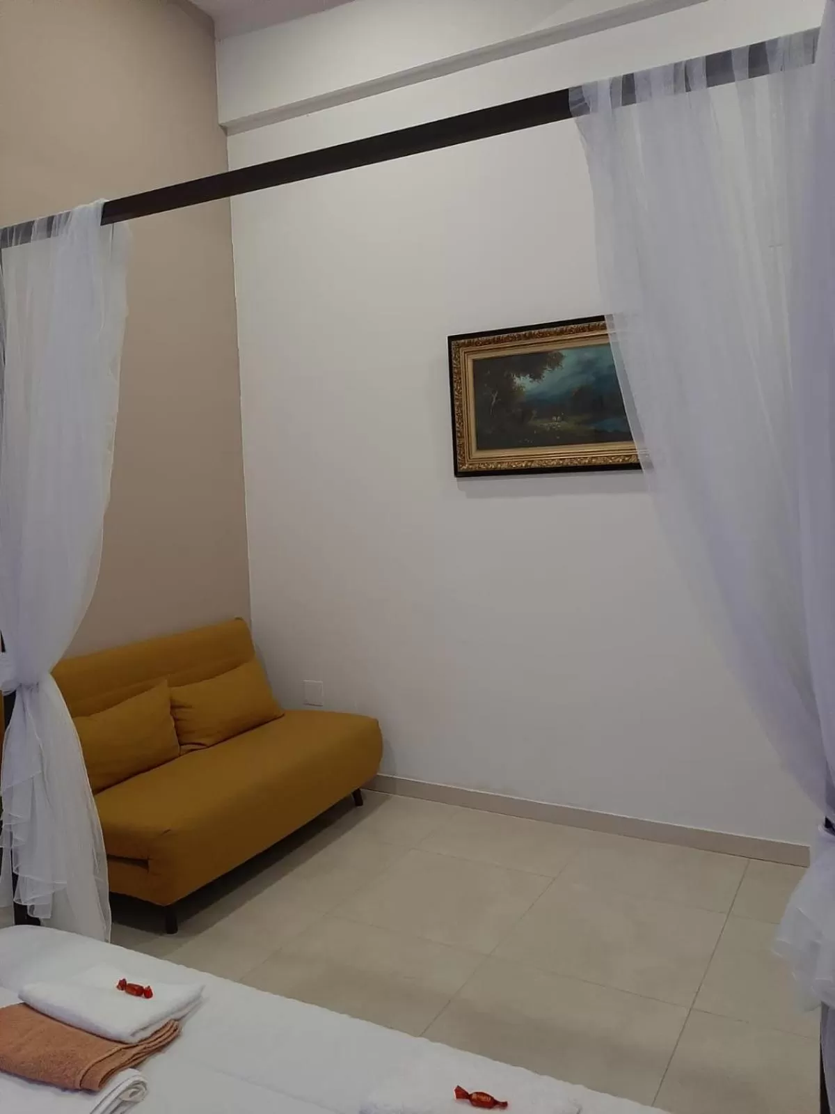 Bed, Seating Area in RELAIS TORRE GLORIA