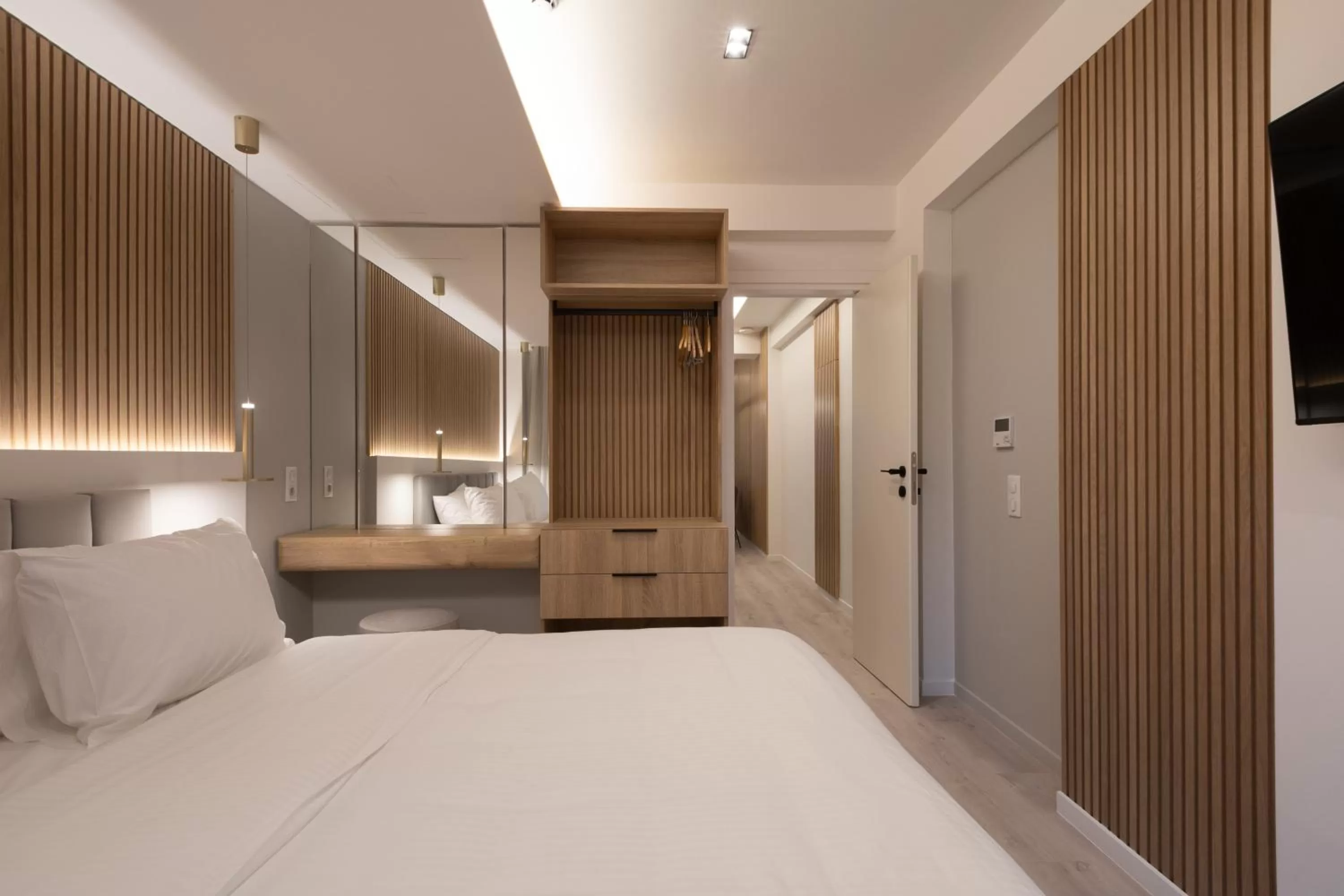 Bed in Incanto Boutique Suites - Neos Kosmos