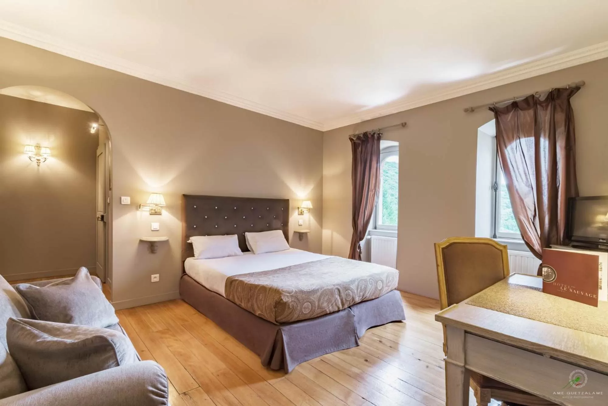 Photo of the whole room, Bed in Hôtel Restaurant Spa Le Sauvage