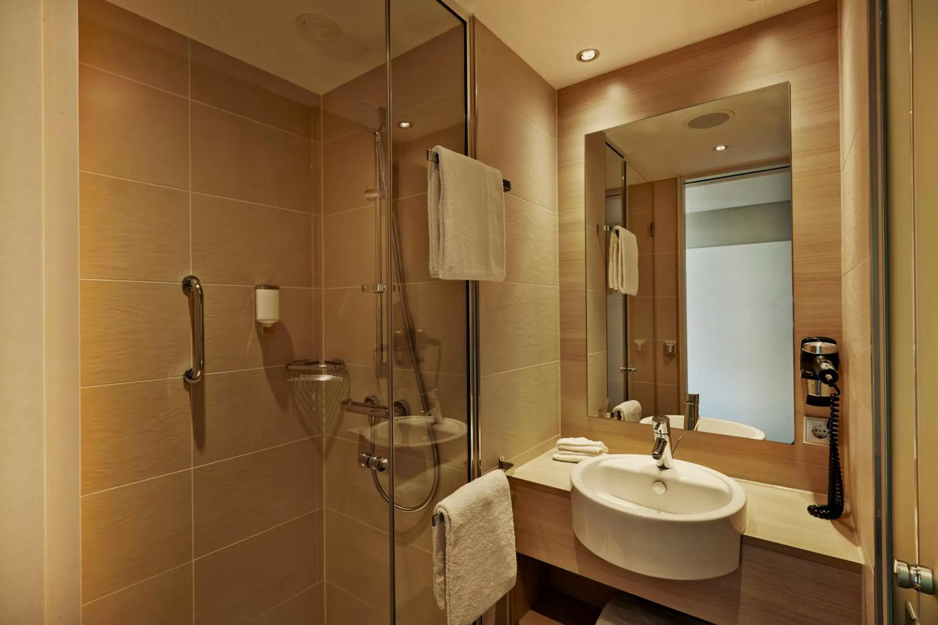 Bathroom in H2 Hotel München Messe Bathroom in H2 Hotel München Messe