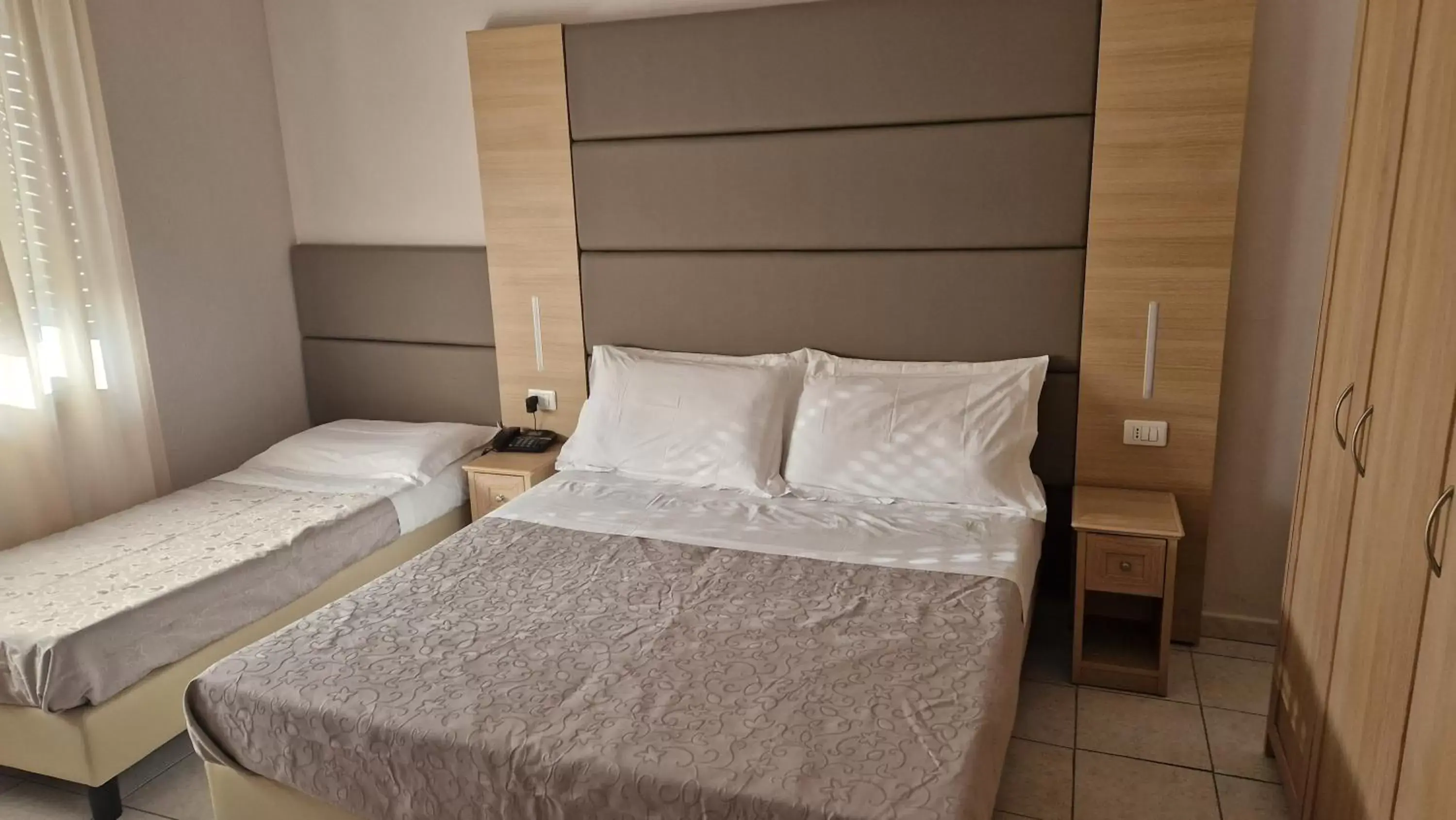 Bed in Hotel Trasimeno Bittarelli
