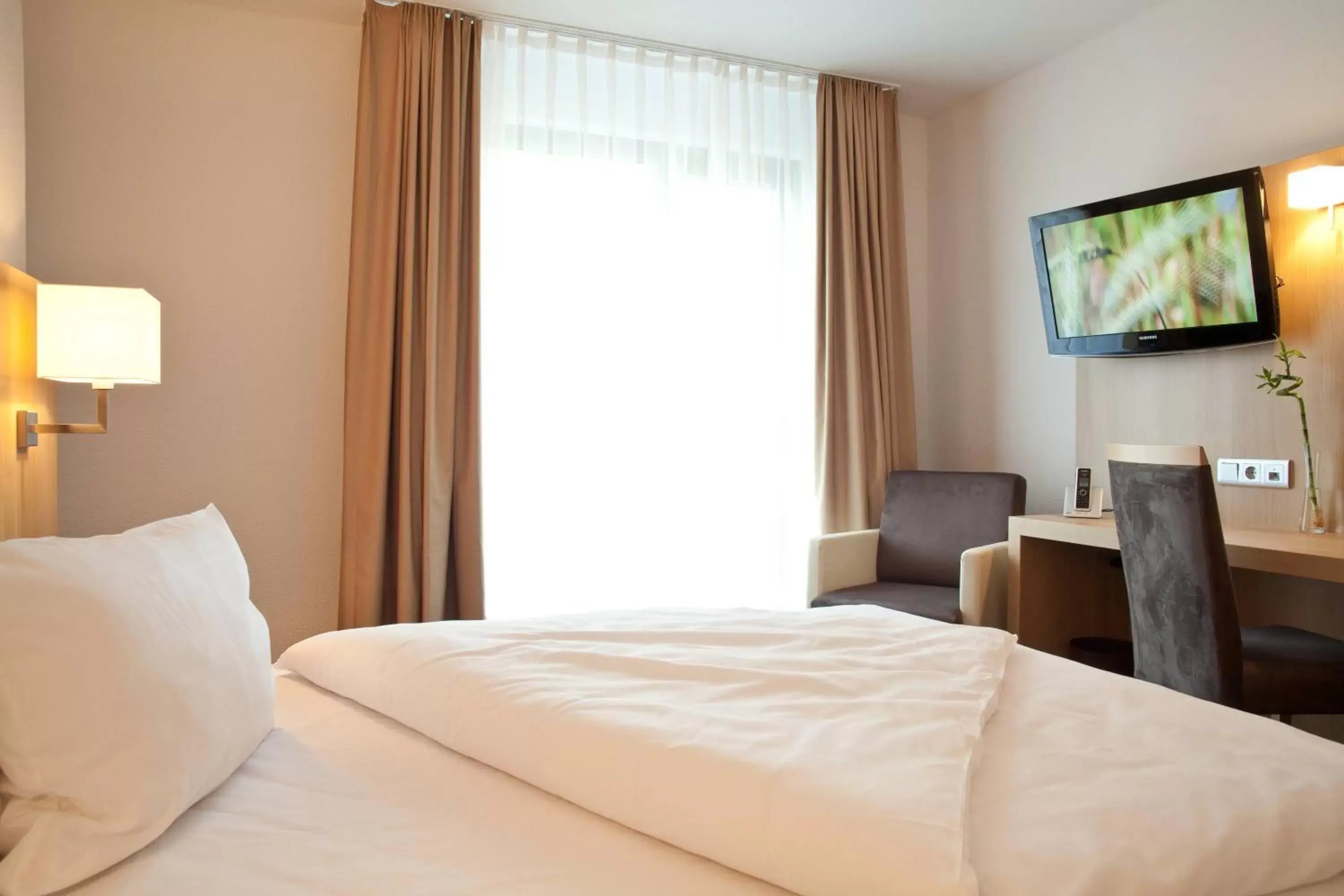 Day, Bed in Lanzcarré Hotel Mannheim, a member of Radisson Individuals