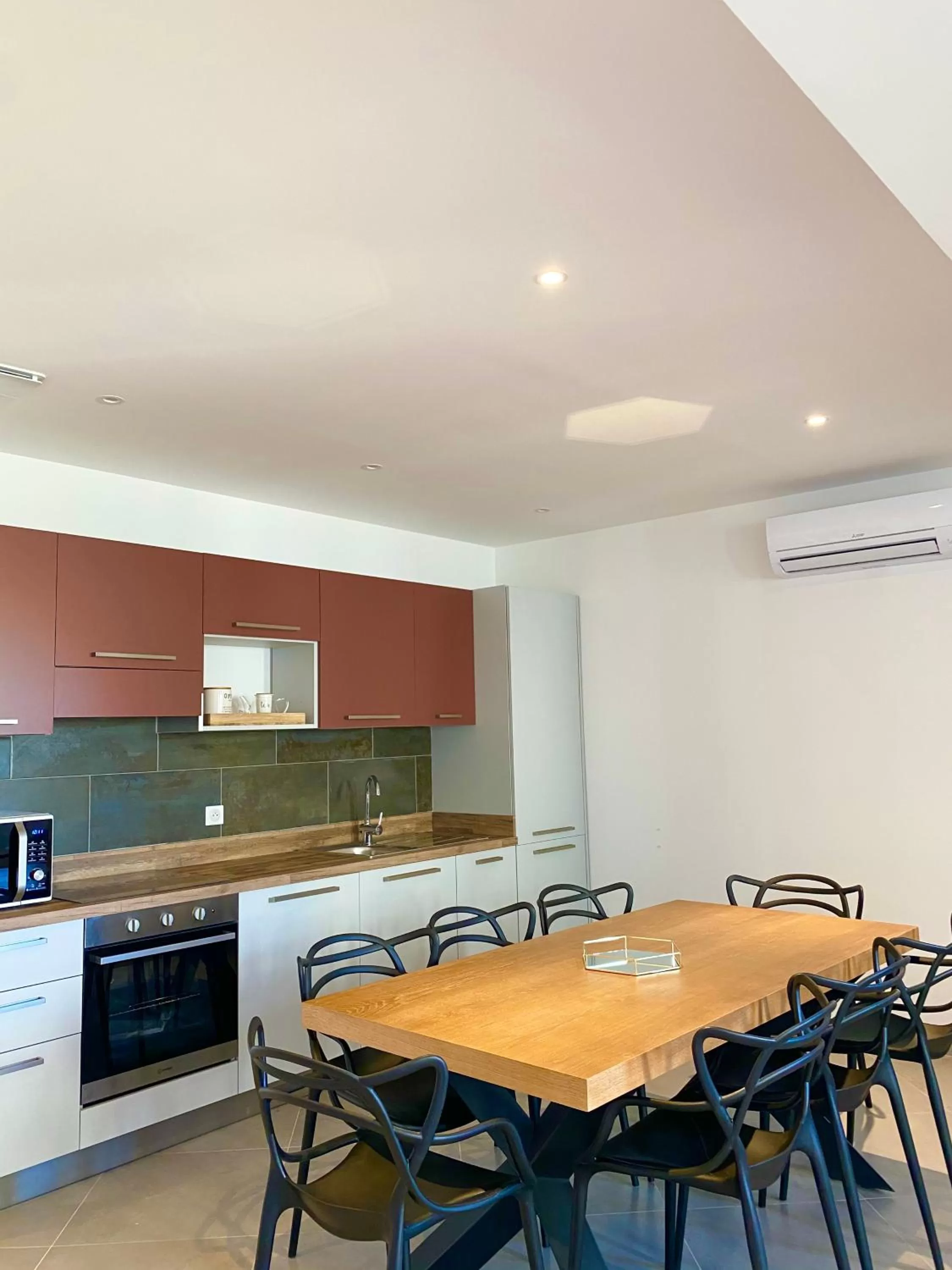 Living room, Kitchen/Kitchenette in Casa u fornu Residence & Spa