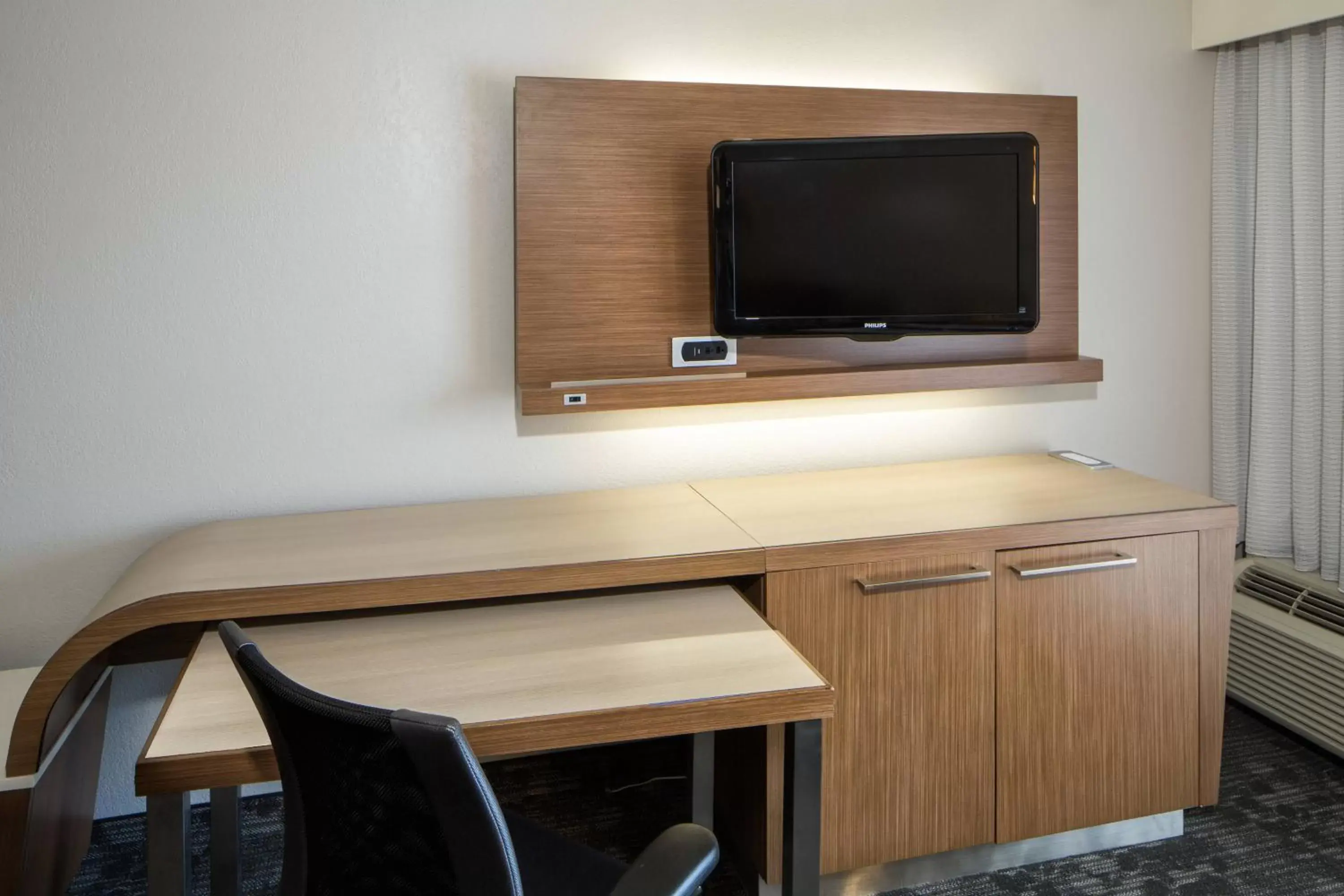 Photo of the whole room, TV/Entertainment Center in Courtyard by Marriott San Antonio Airport/North Star Mall