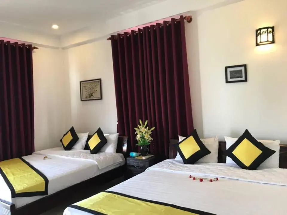 Bed in Quynh Chau Homestay Hội An