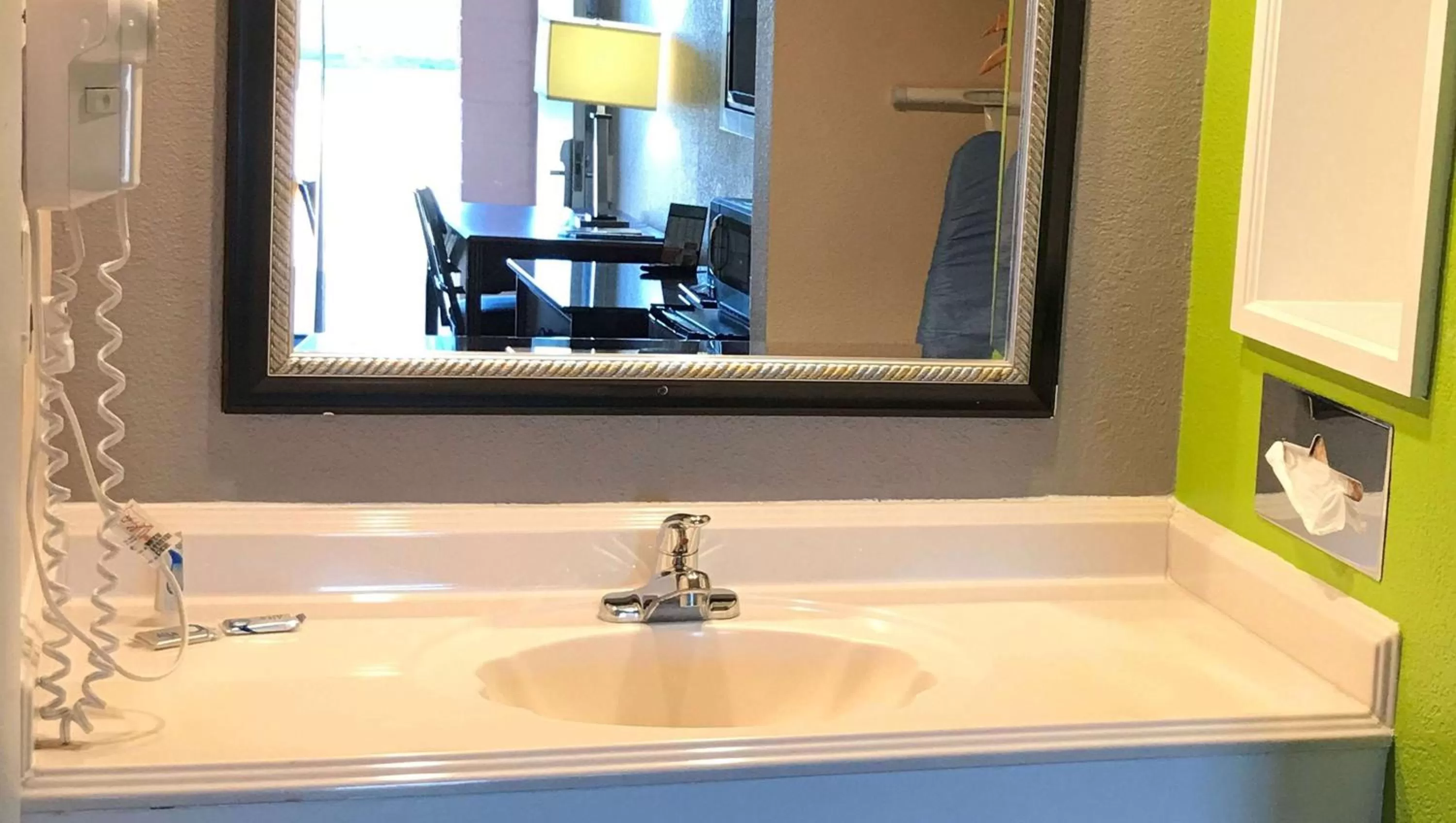 Bathroom in Magnuson Hotel Virginia Beach