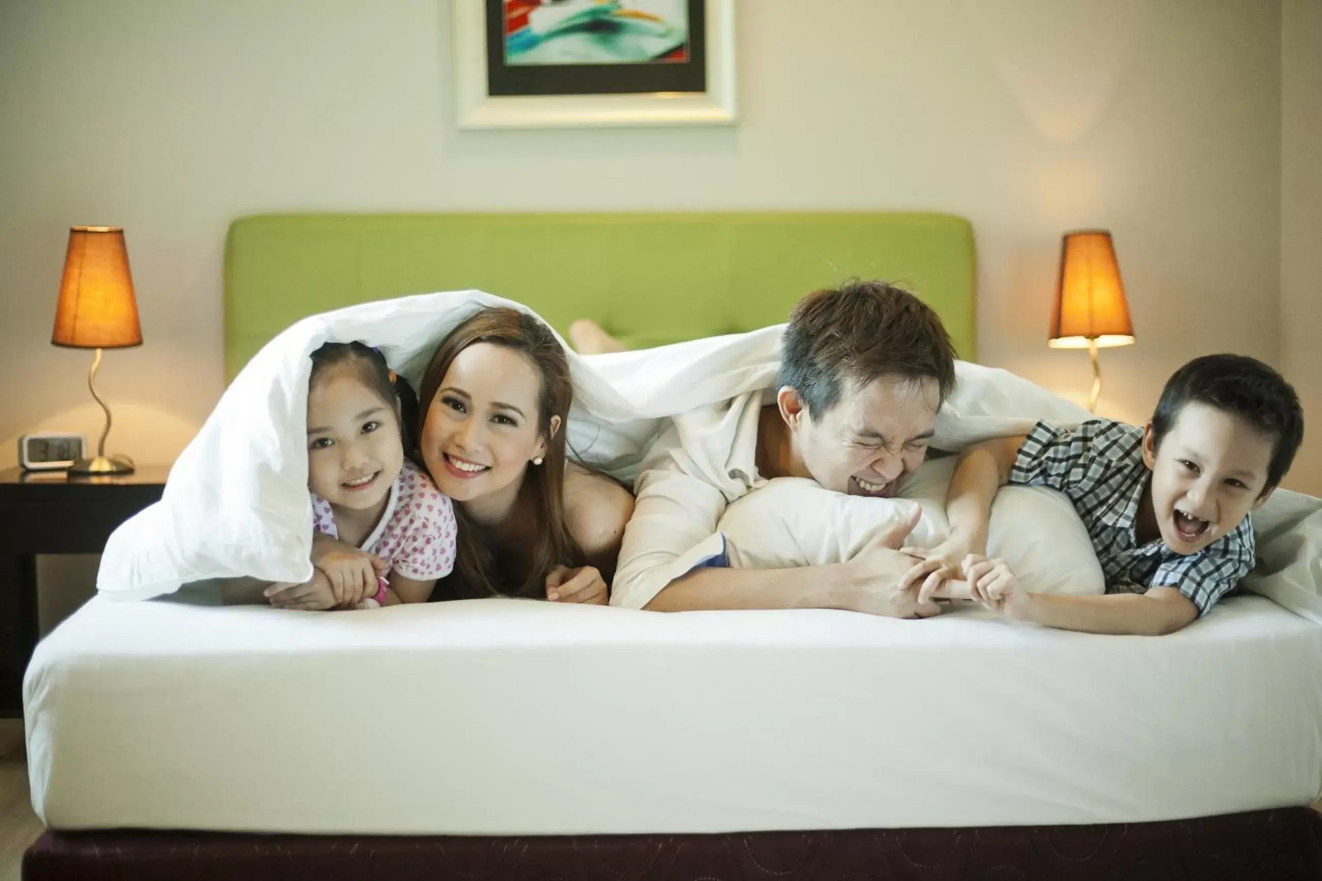 Bed, Family in The Exchange Regency Residence Hotel Managed by HII