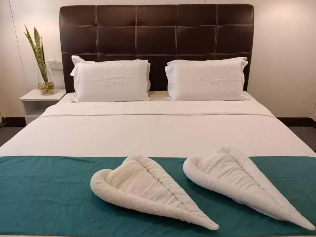 Bed in Airis Sanctuary Resort