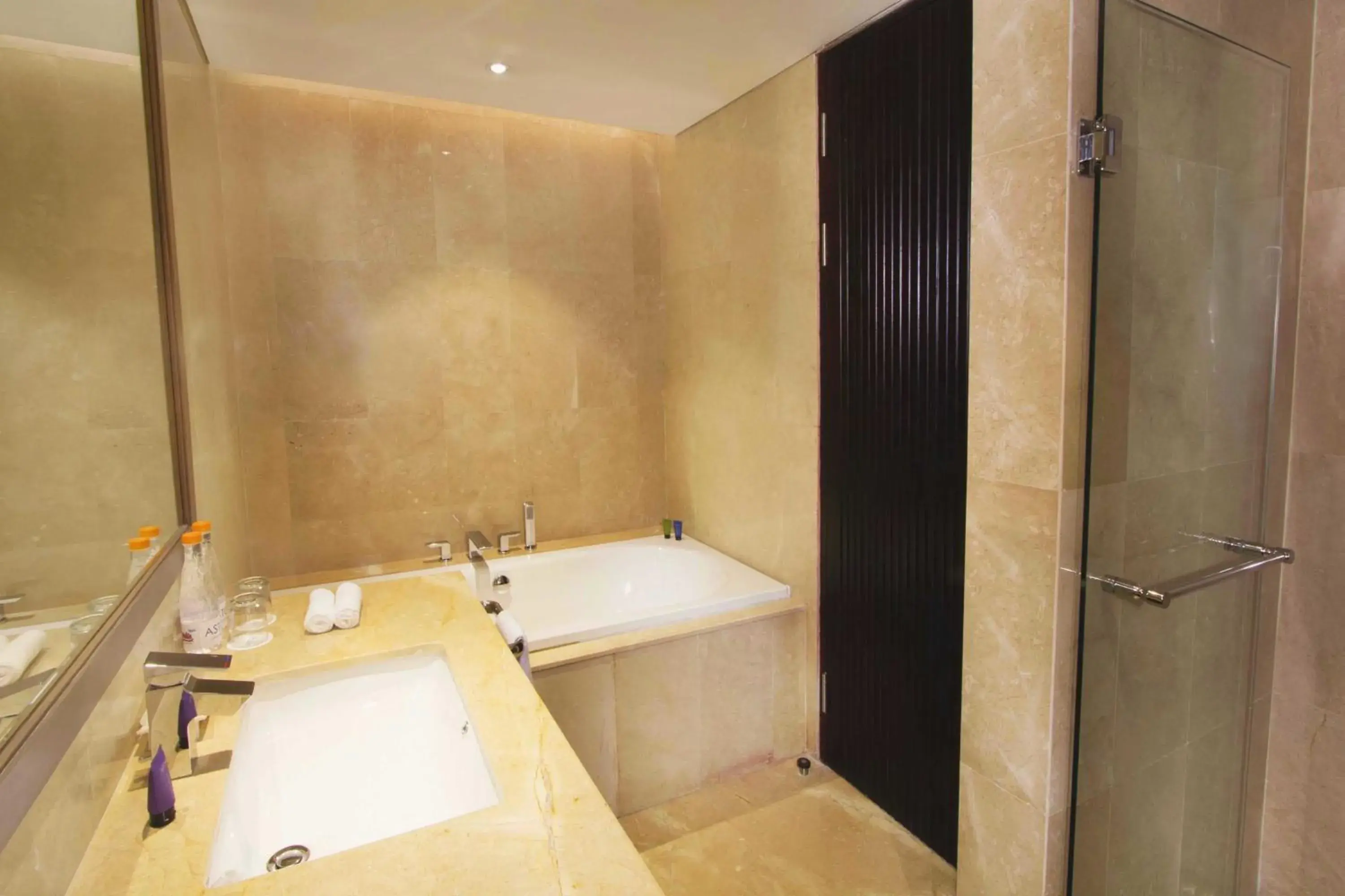 Bathroom in Aston Priority Simatupang Hotel and Conference Center Bathroom in Aston Priority Simatupang Hotel and Conference Center