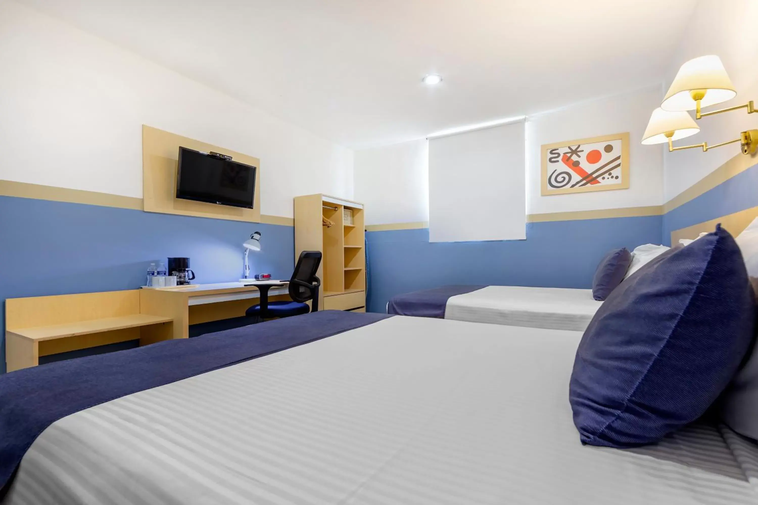 Bed in Sleep Inn Tuxtla