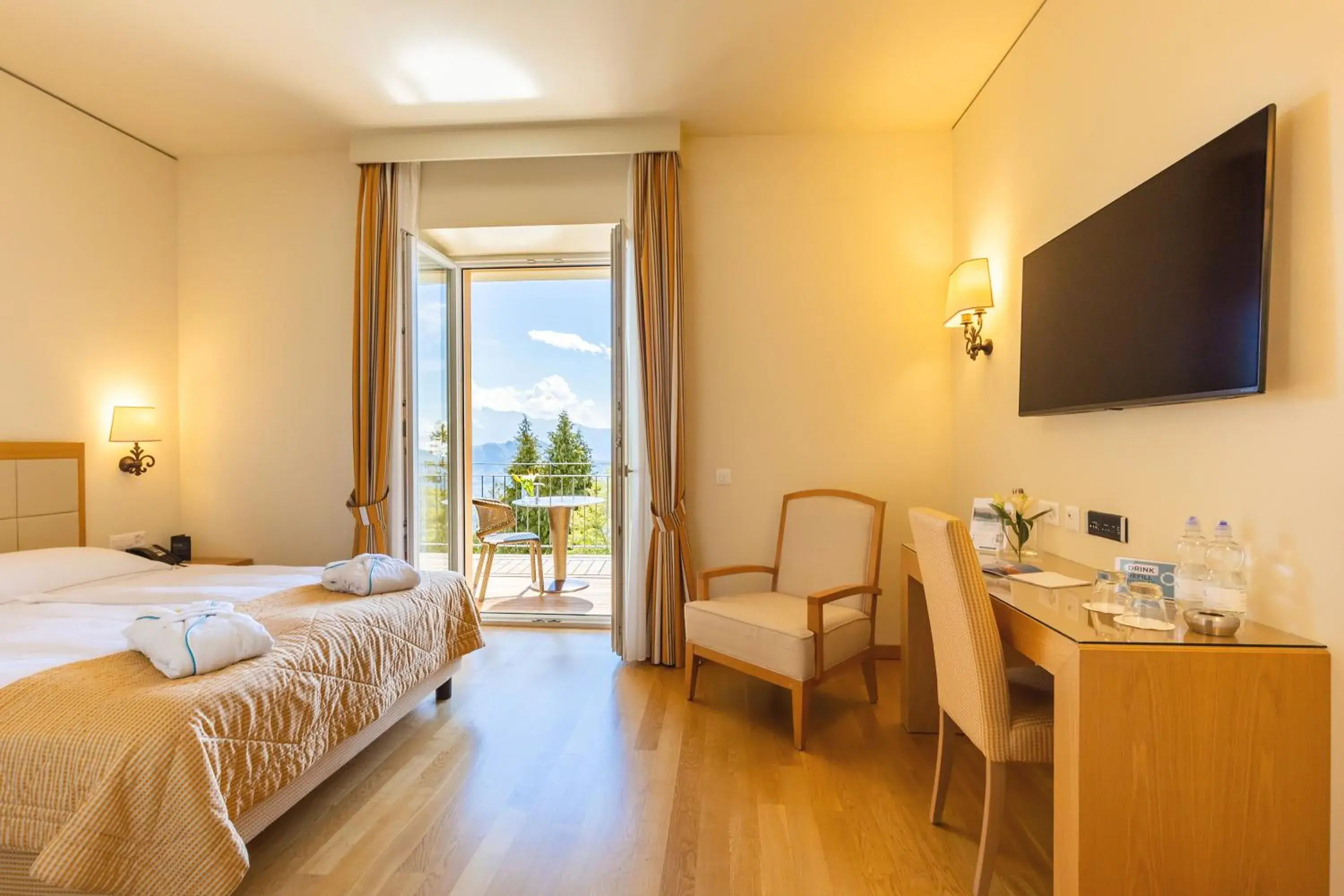 Seating area in Kurhaus Cademario Hotel & DOT Spa - Ticino Hotels Group
