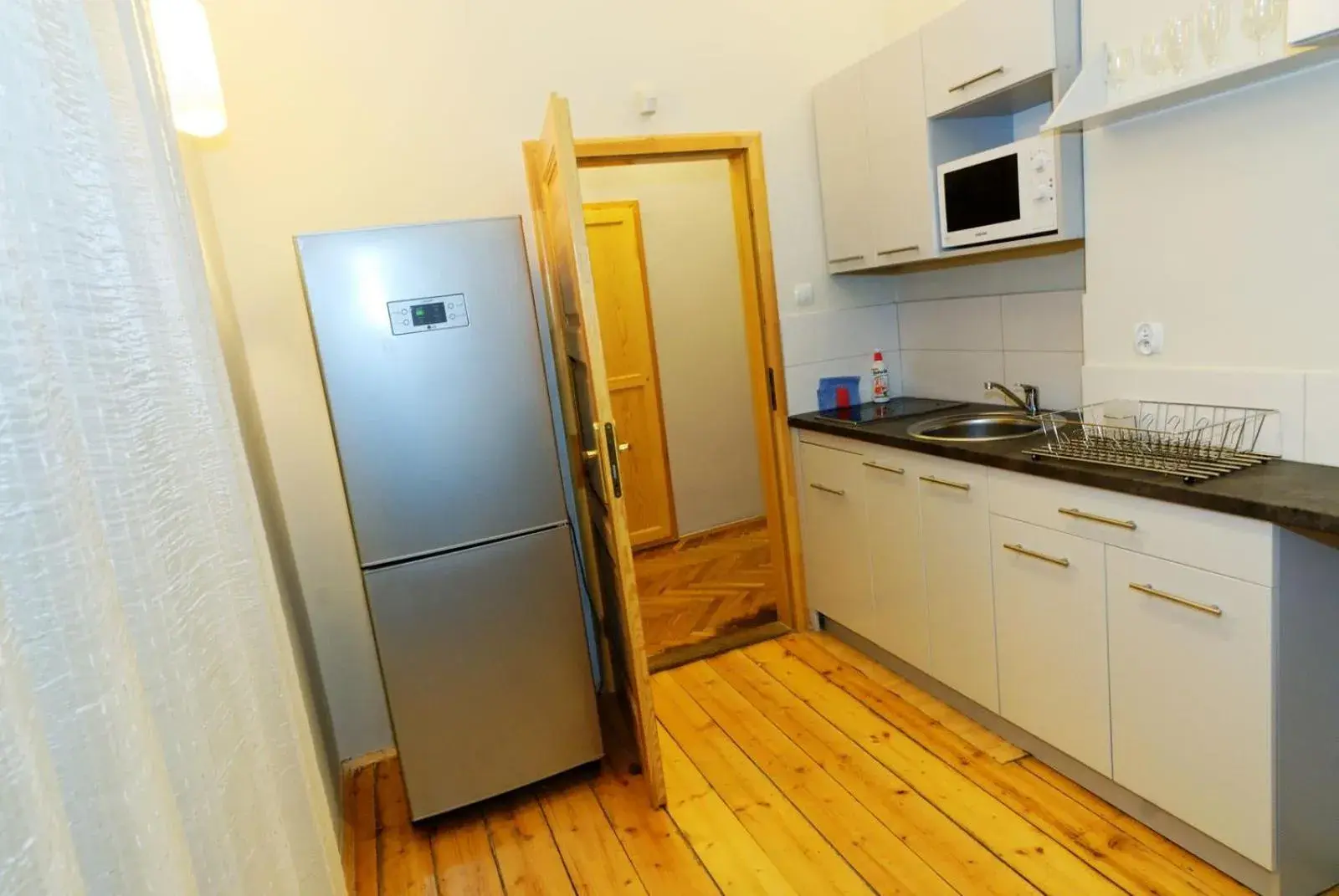 Kitchen/Kitchenette in P&J Tourist Apartments