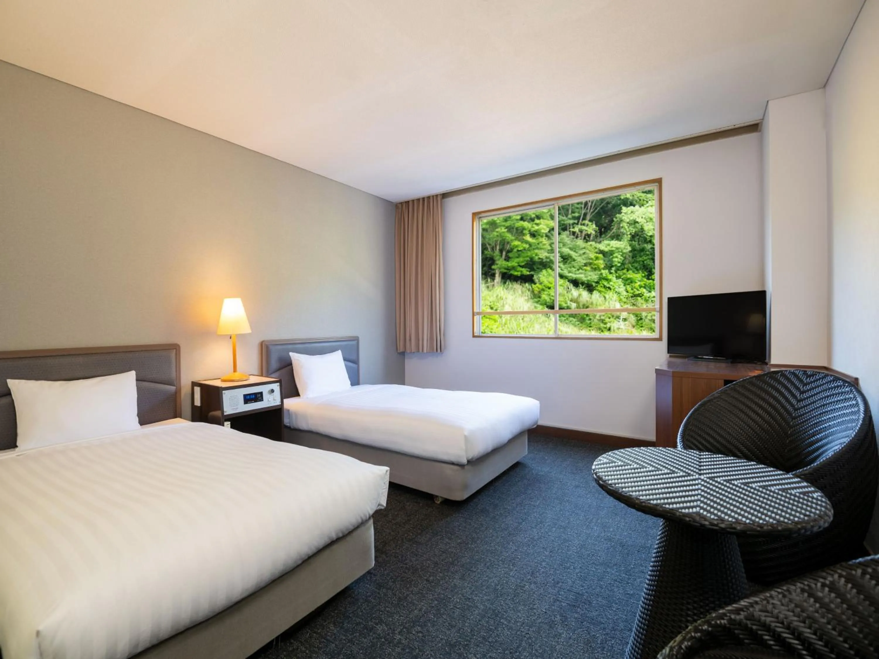 Photo of the whole room, Bed in Kirishima Kokusai Hotel