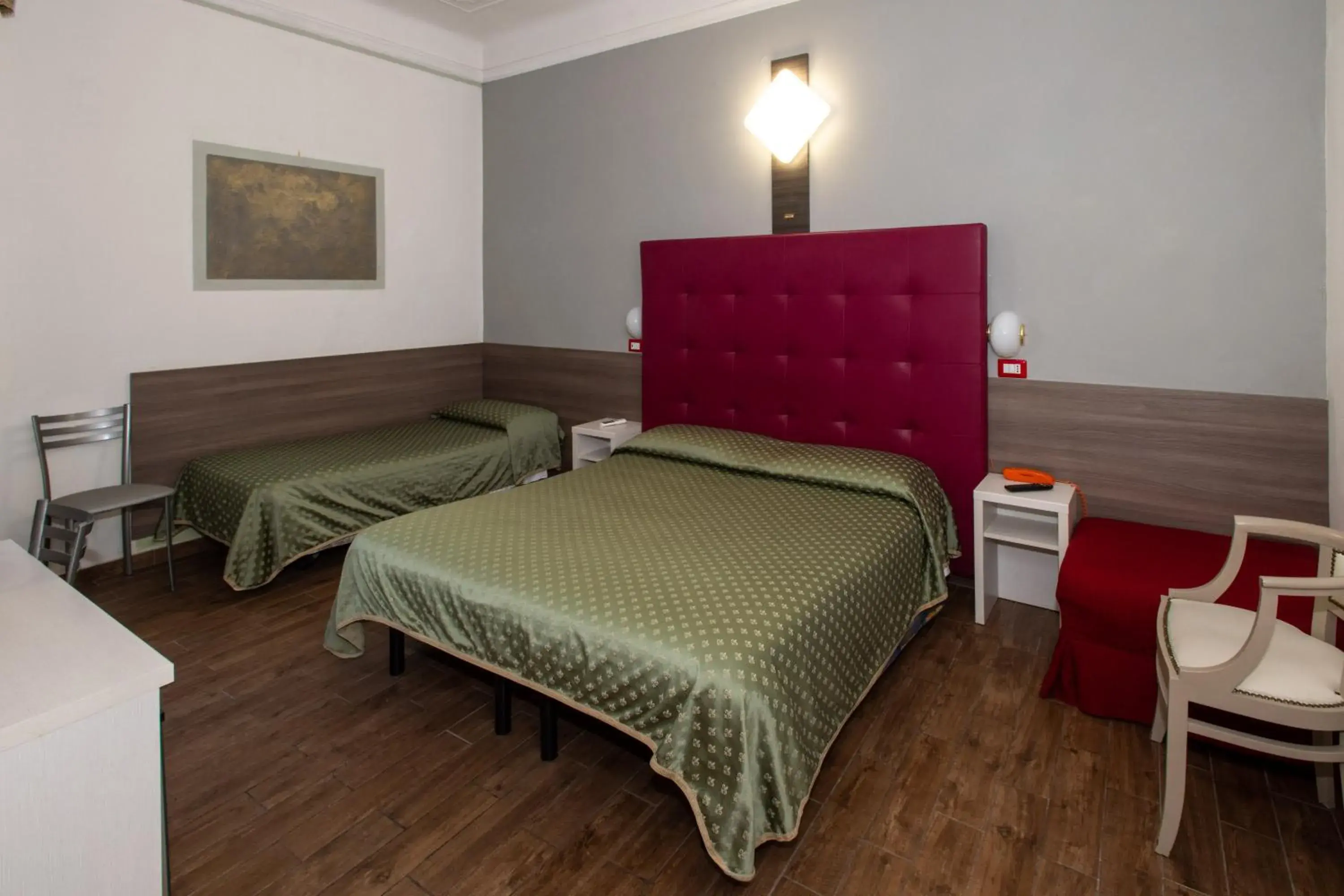 Bed in Hotel Piola