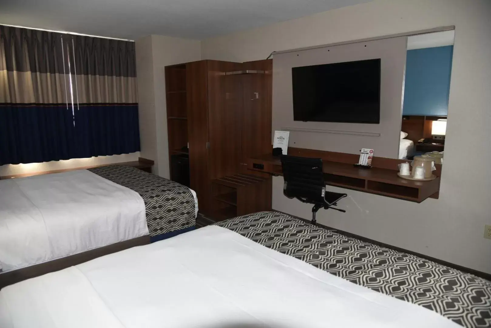 Bed in Microtel Inn & Suites by Wyndham Fond Du Lac Bed in Microtel Inn & Suites by Wyndham Fond Du Lac