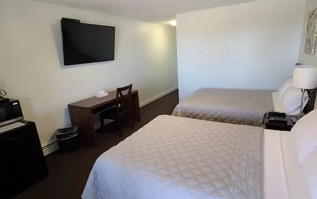 Bed in Onoway Inn and Suites