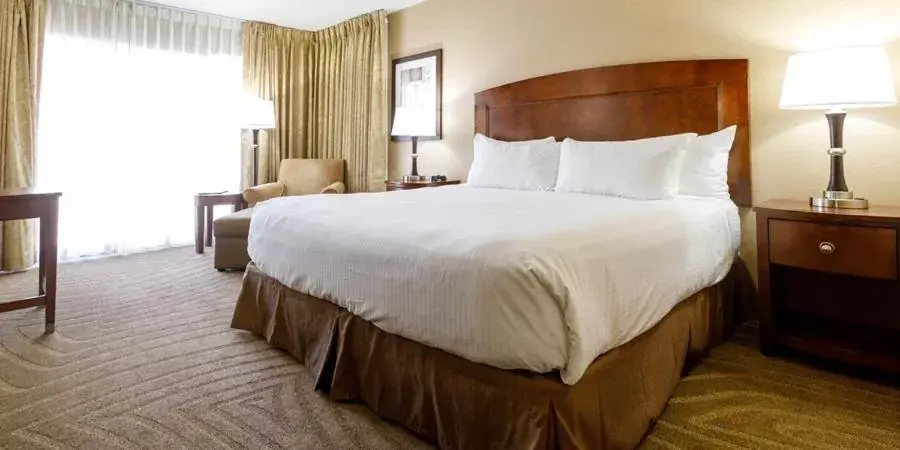 Bed in Maverick Hotel and Casino by Red Lion Hotels