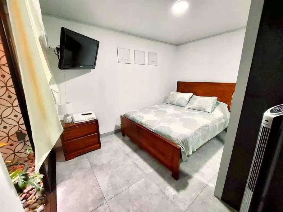 Photo of the whole room, Bed in Airport SJO Residence - Edward & Familia Inn