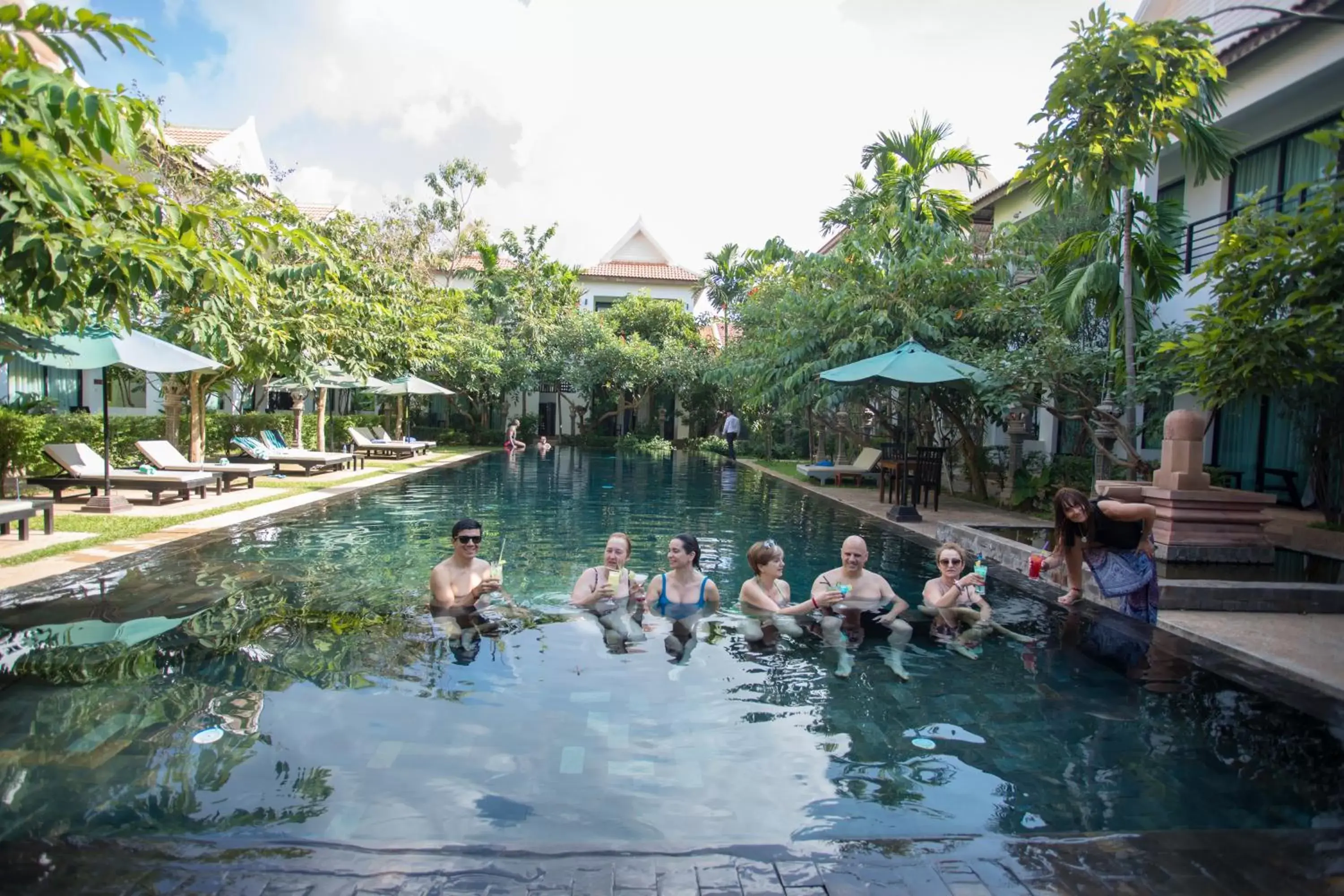 group of guests, Swimming Pool in Tanei Angkor Resort and Spa