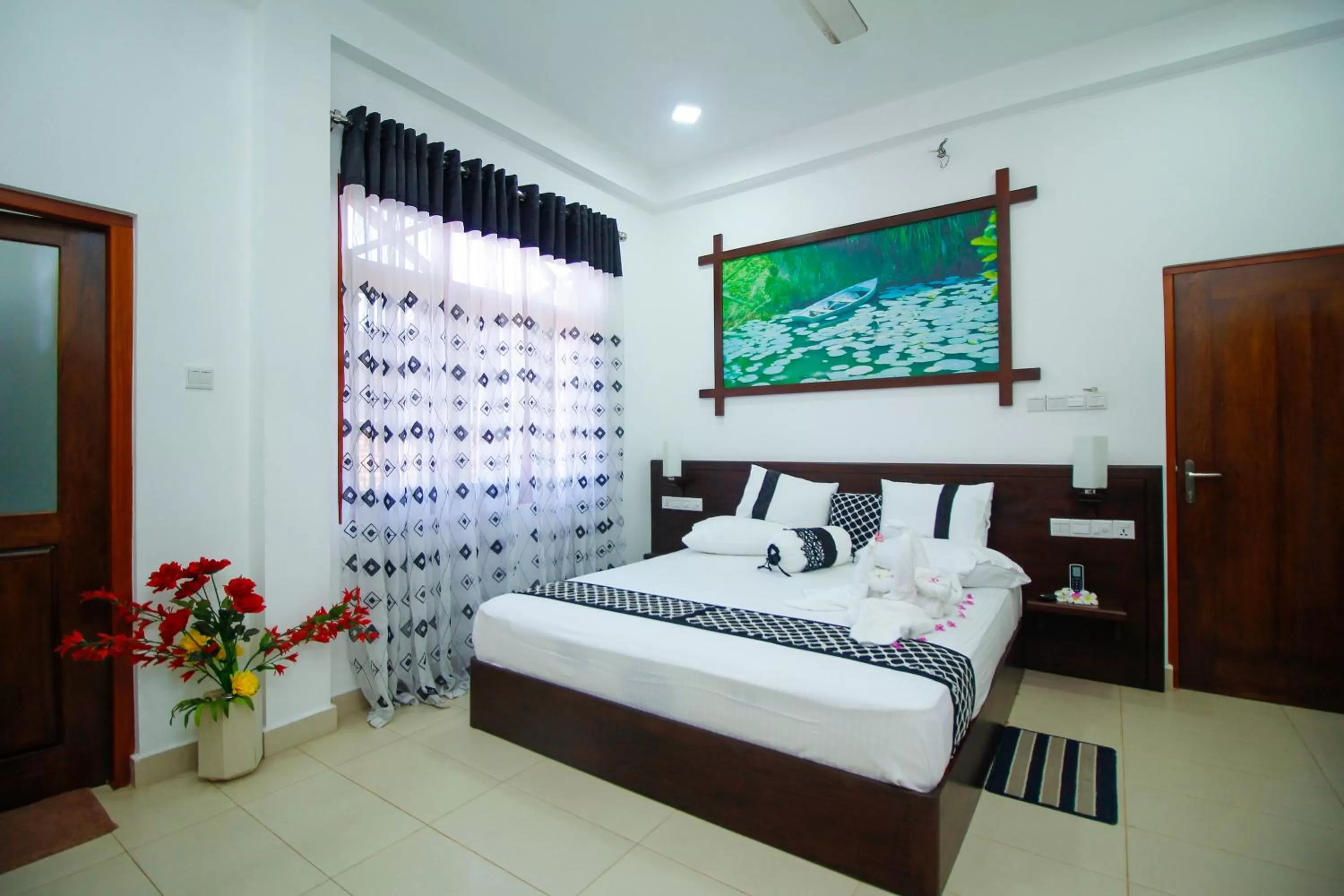 Bedroom, TV/Entertainment Center in Dedunu Home Bentota