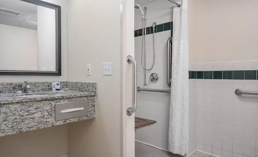 Bathroom in AmericInn by Wyndham Grafton