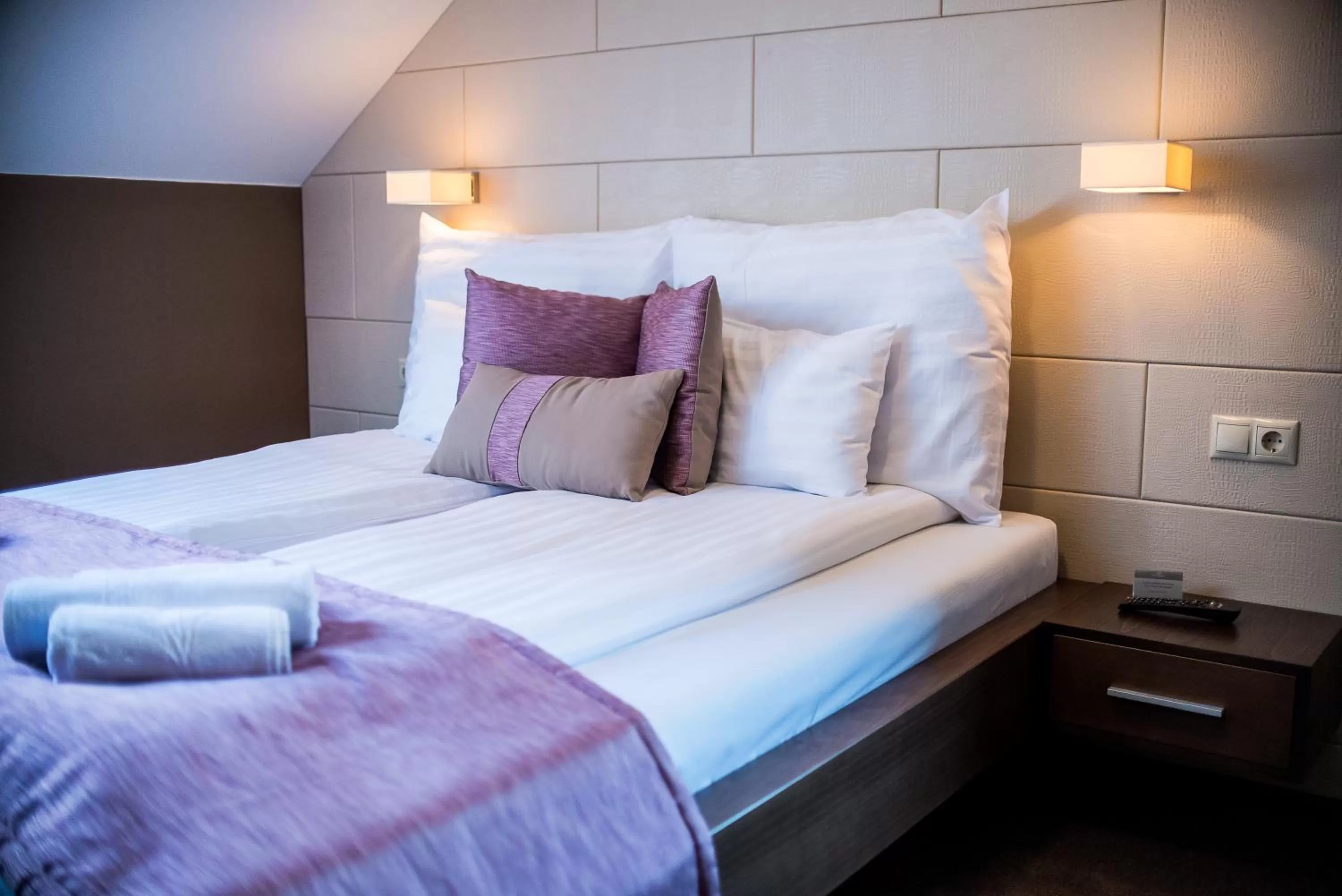 Bed in Hotel Fürdőház