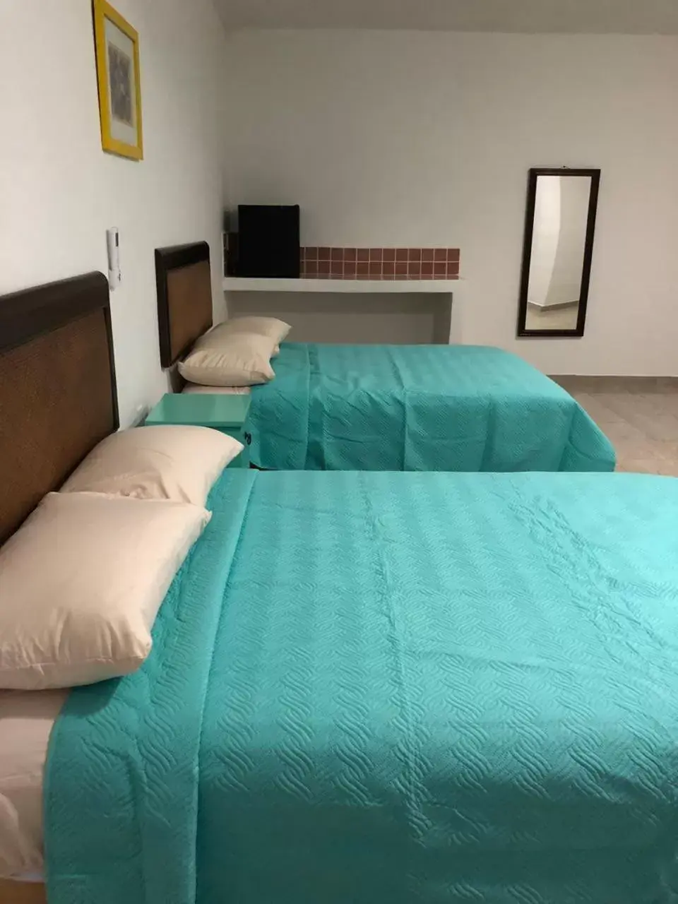 Bed in Airport Sleepy Inn