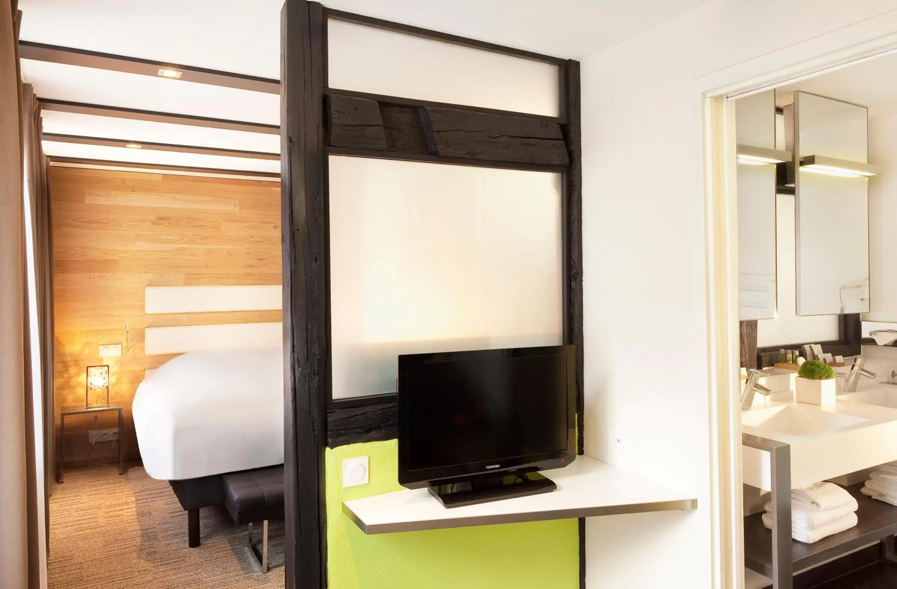 TV and multimedia, TV/Entertainment Center in Hotel Le Colombier Suites