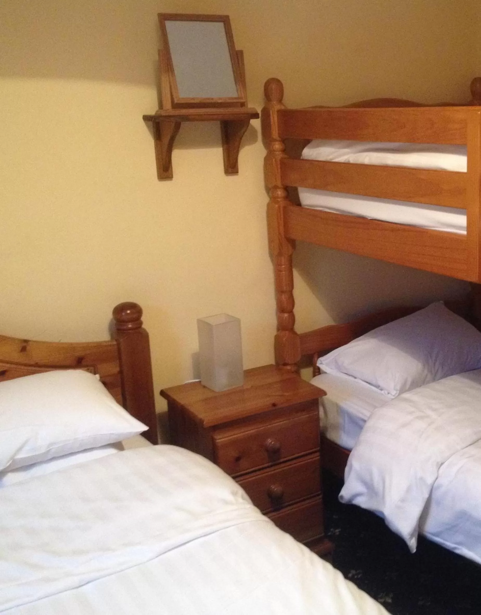 Bed in Twin Lions Hotel