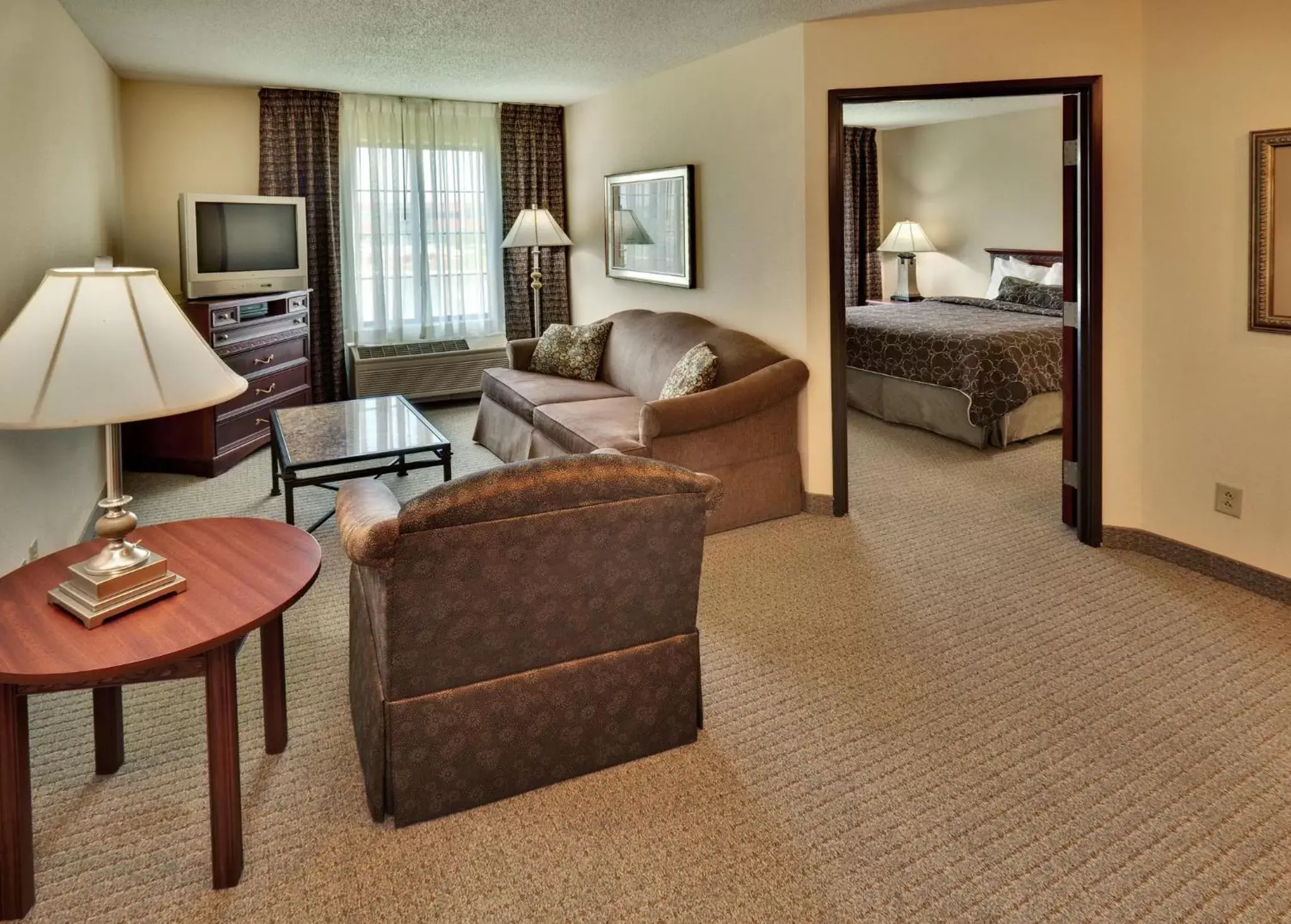 Photo of the whole room, Seating Area in Staybridge Suites West Des Moines, an IHG Hotel