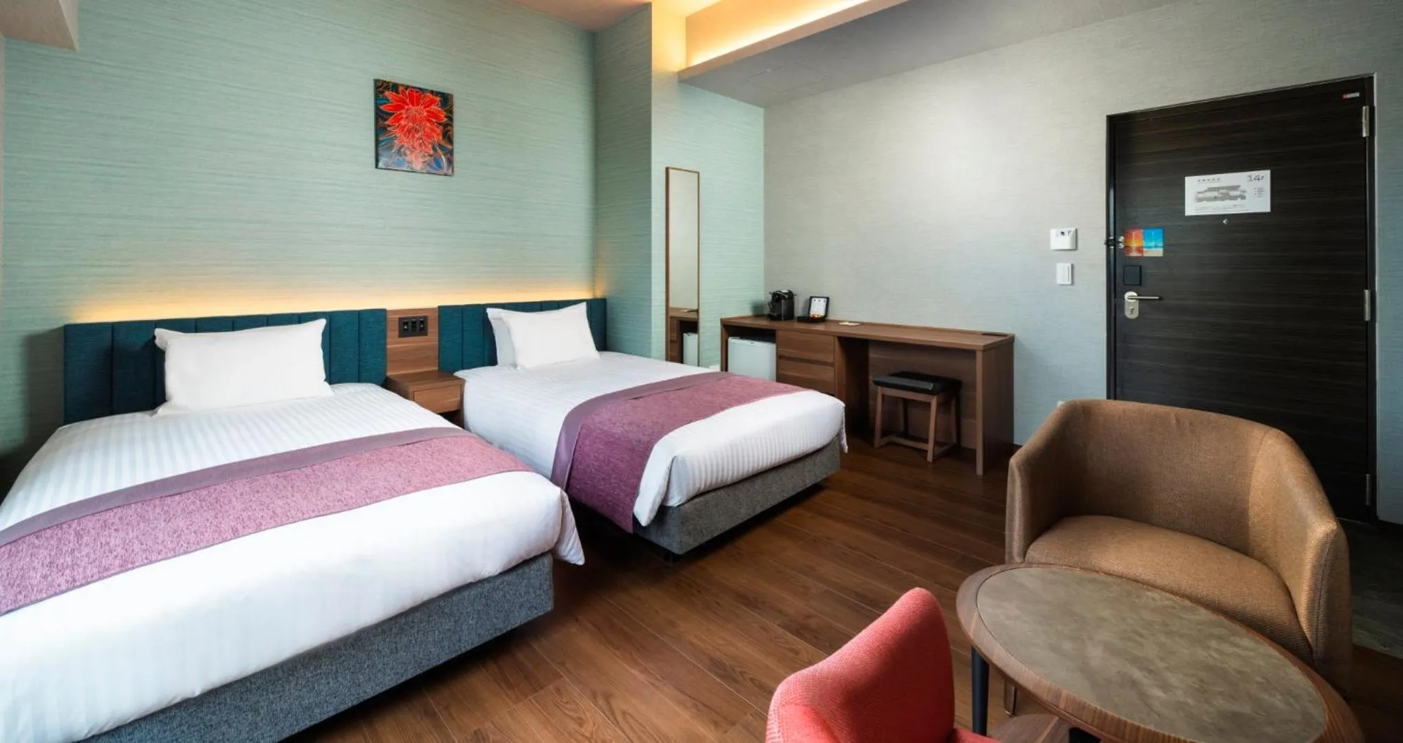 Bed in HOTEL SANSUI NAHA Ryukyu Onsen Naminoue-No-Yu