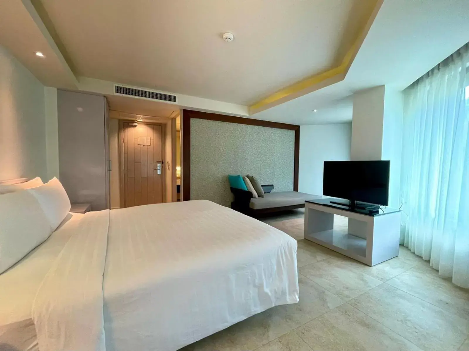 Bed, TV/Entertainment Center in Zenmaya Oceanfront Phuket, Trademark Collection by Wyndham