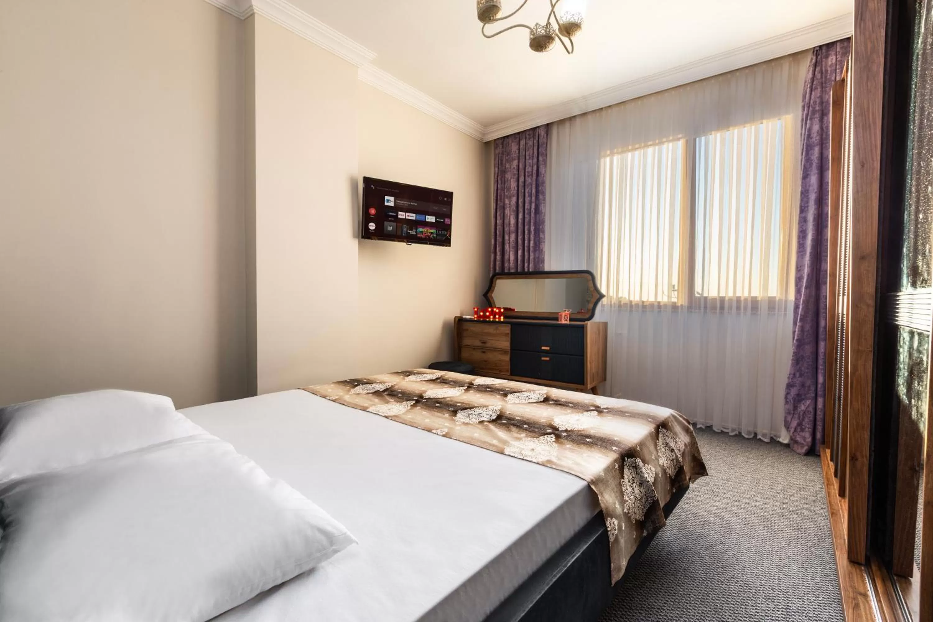 Bed in Bikka&Asell Suite Hotel