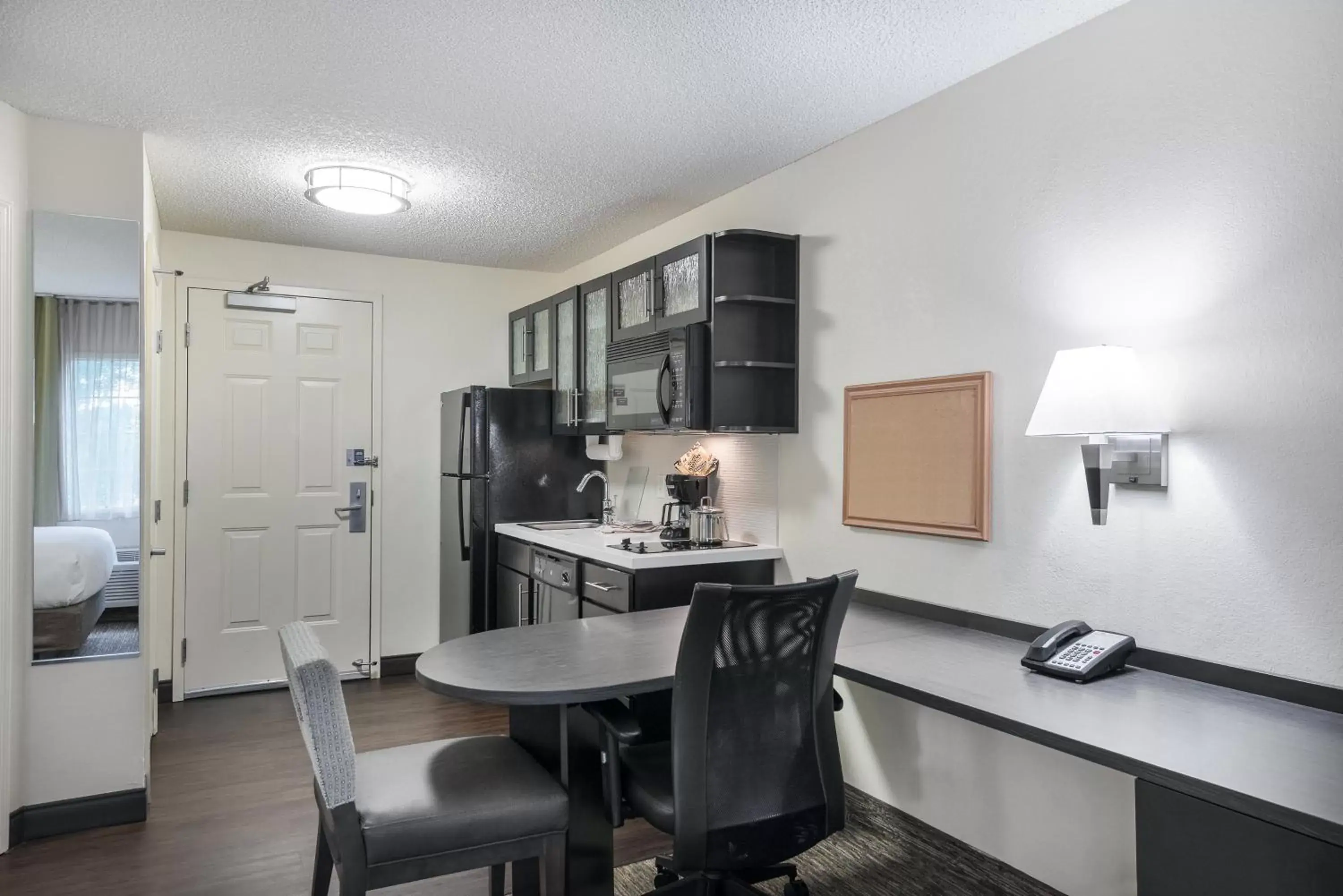 Photo of the whole room, Kitchen/Kitchenette in Candlewood Suites Lake Mary, an IHG Hotel