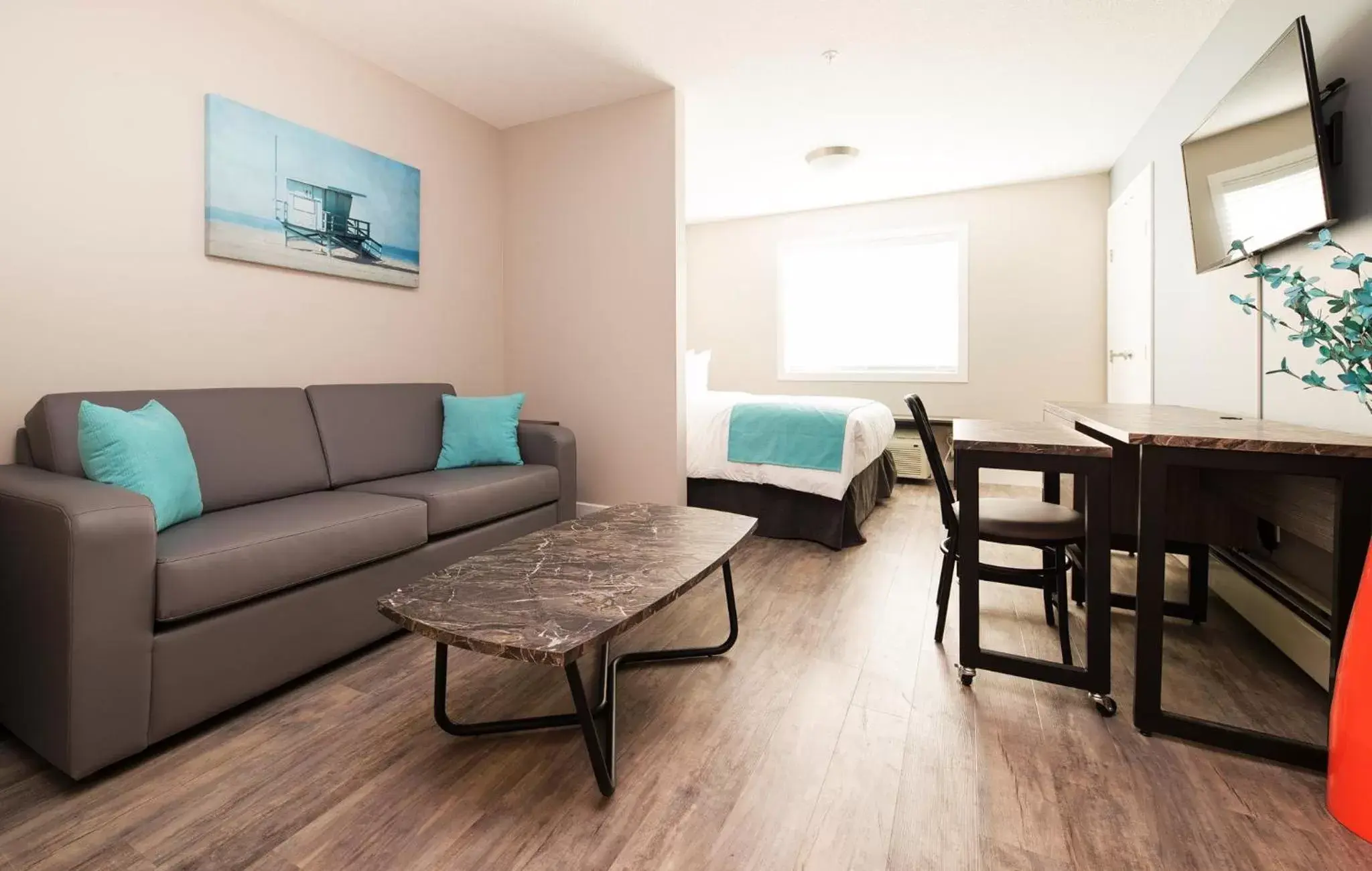 Living room, Seating Area in The Suites, INN Hotels