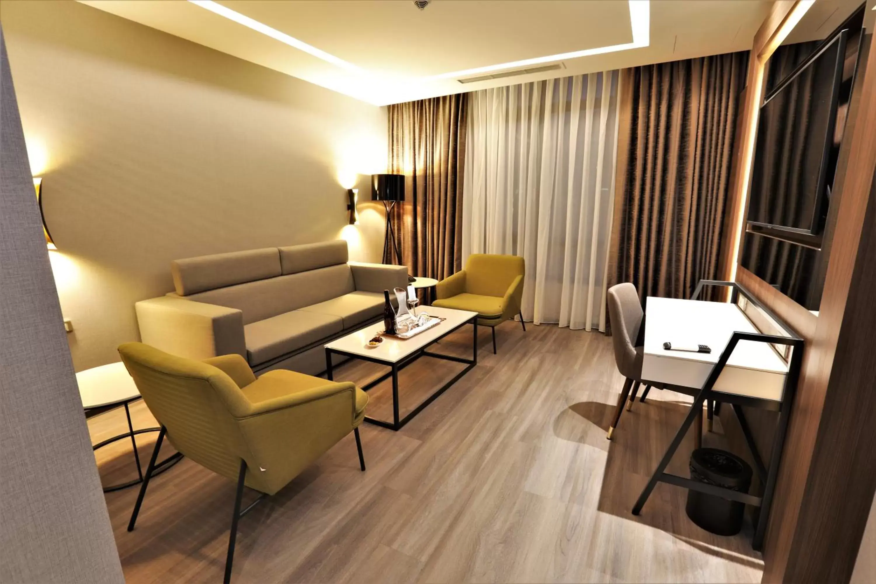 Living room, Seating Area in Limak Skopje Luxury Hotel