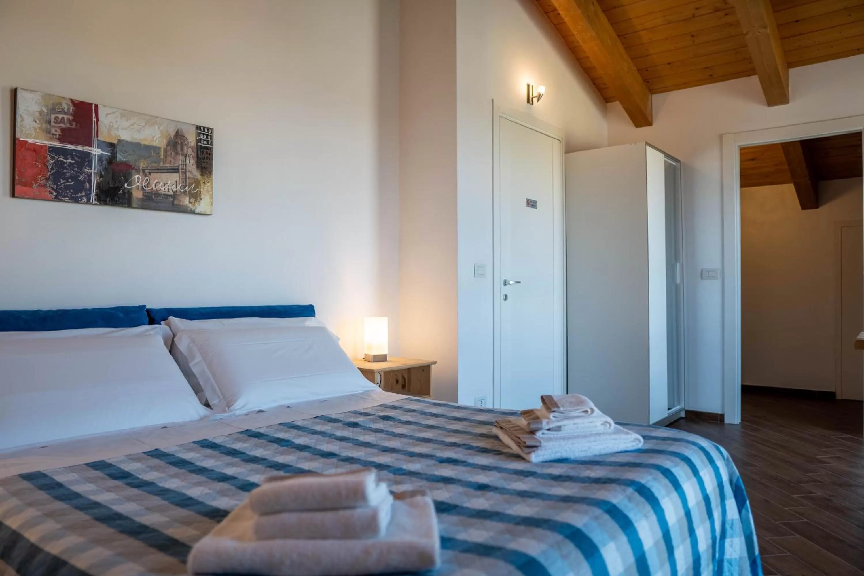 Photo of the whole room, Bed in Residence Le Palme