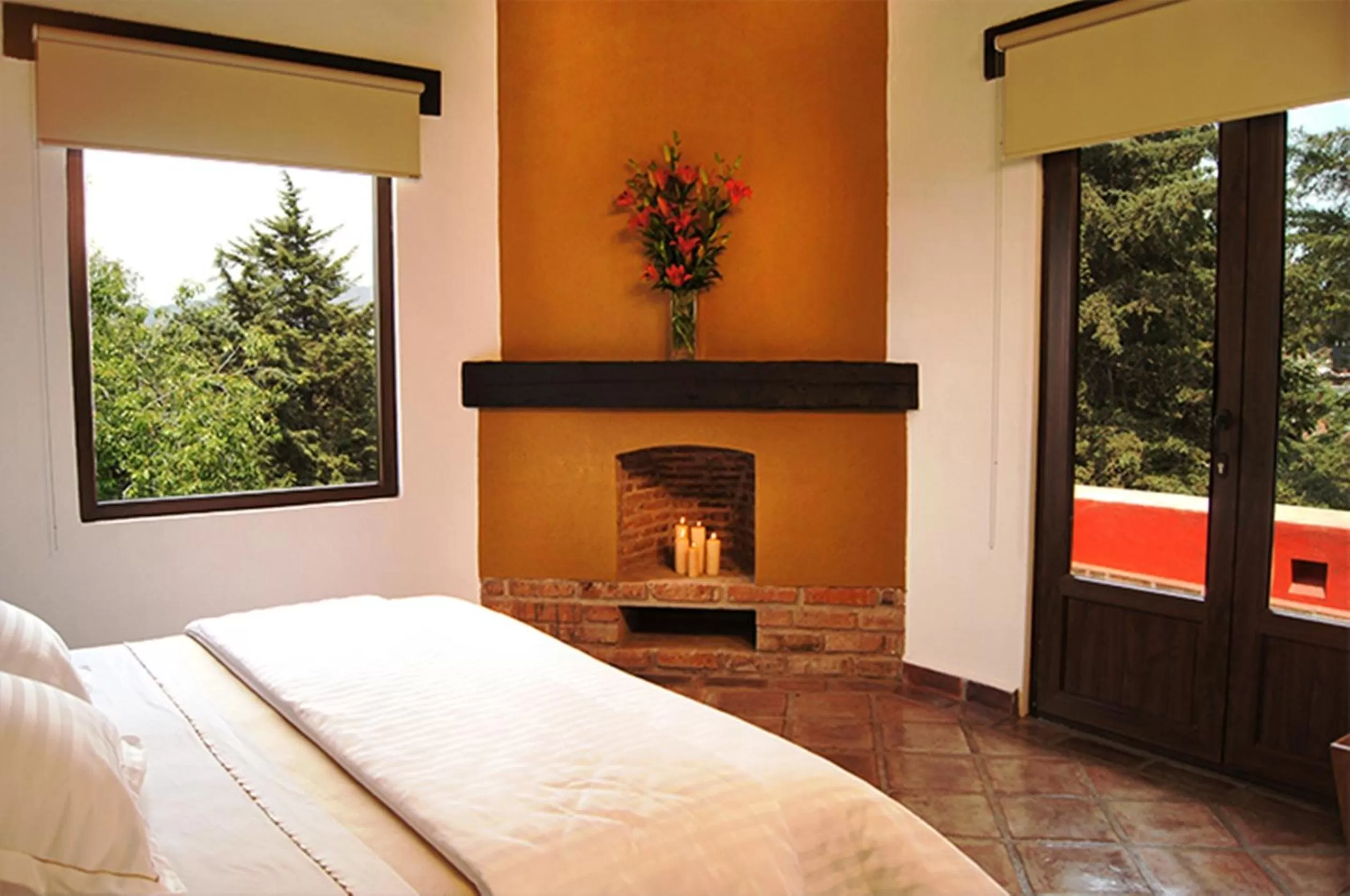 Balcony/Terrace, Bed in Hotel Hacienda San Martin