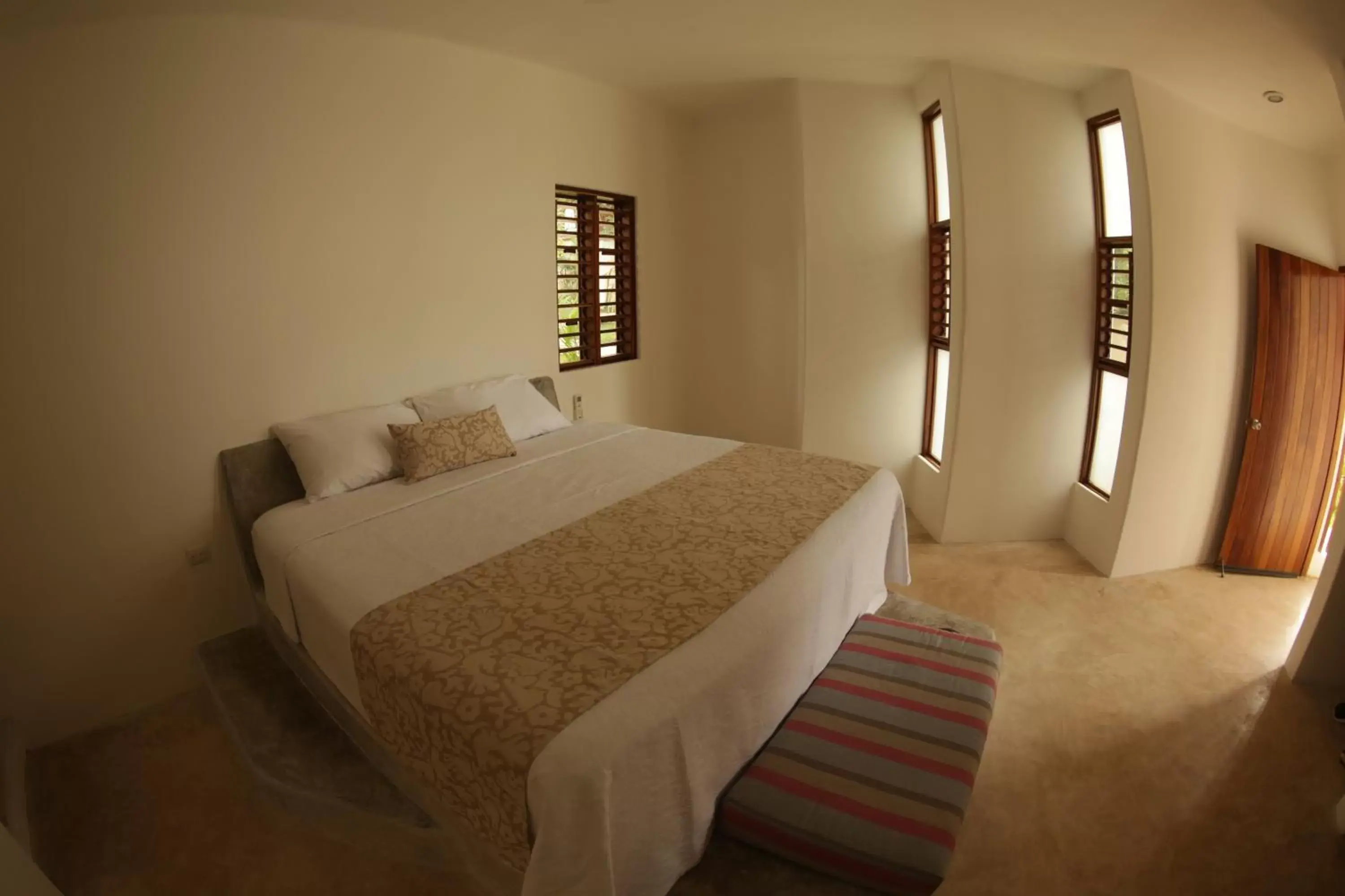 Bed in Mi Kasa Tu Kasa Bacalar by Nah Hotels