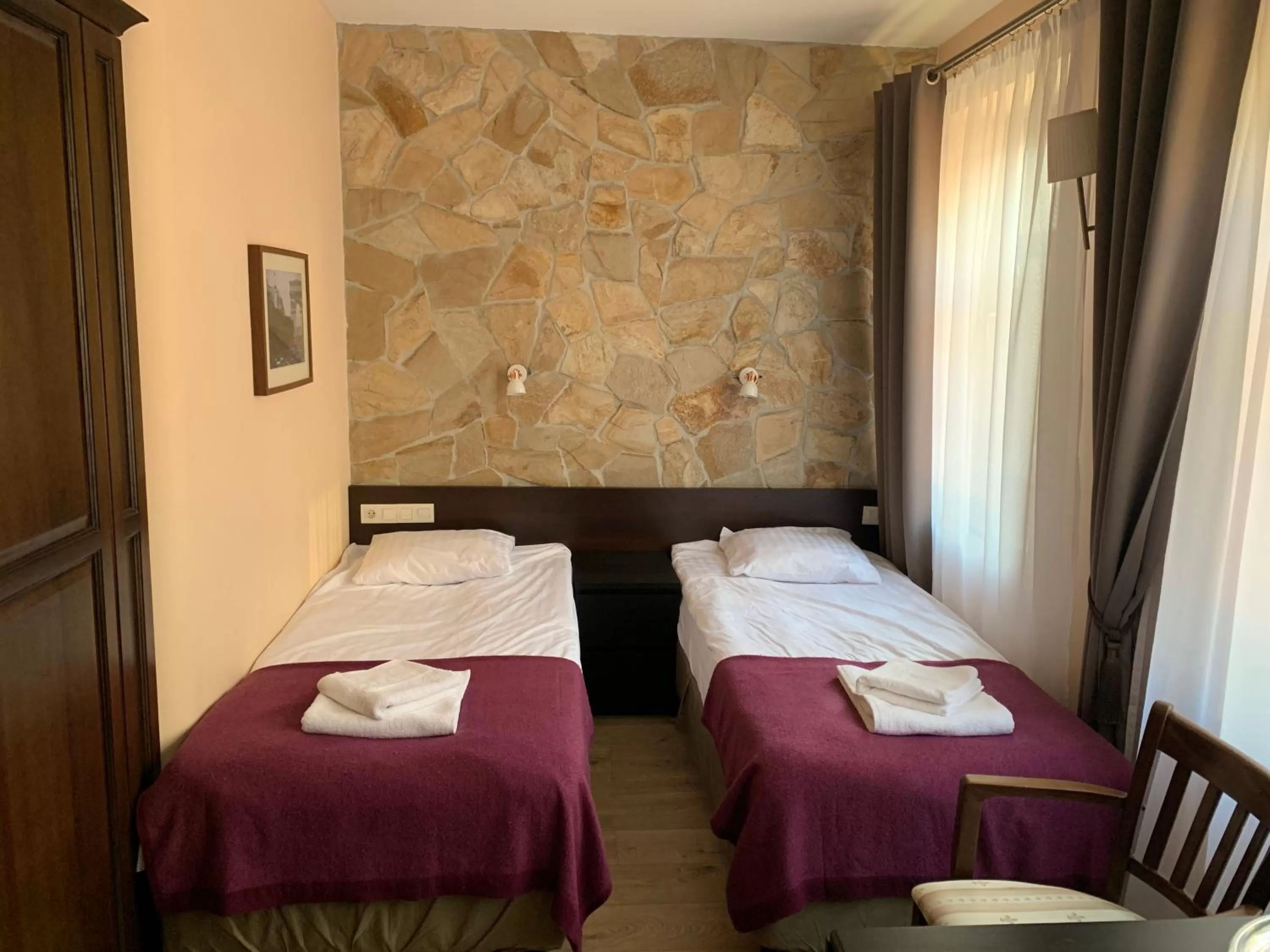 Bed in GRONO Apartamenty