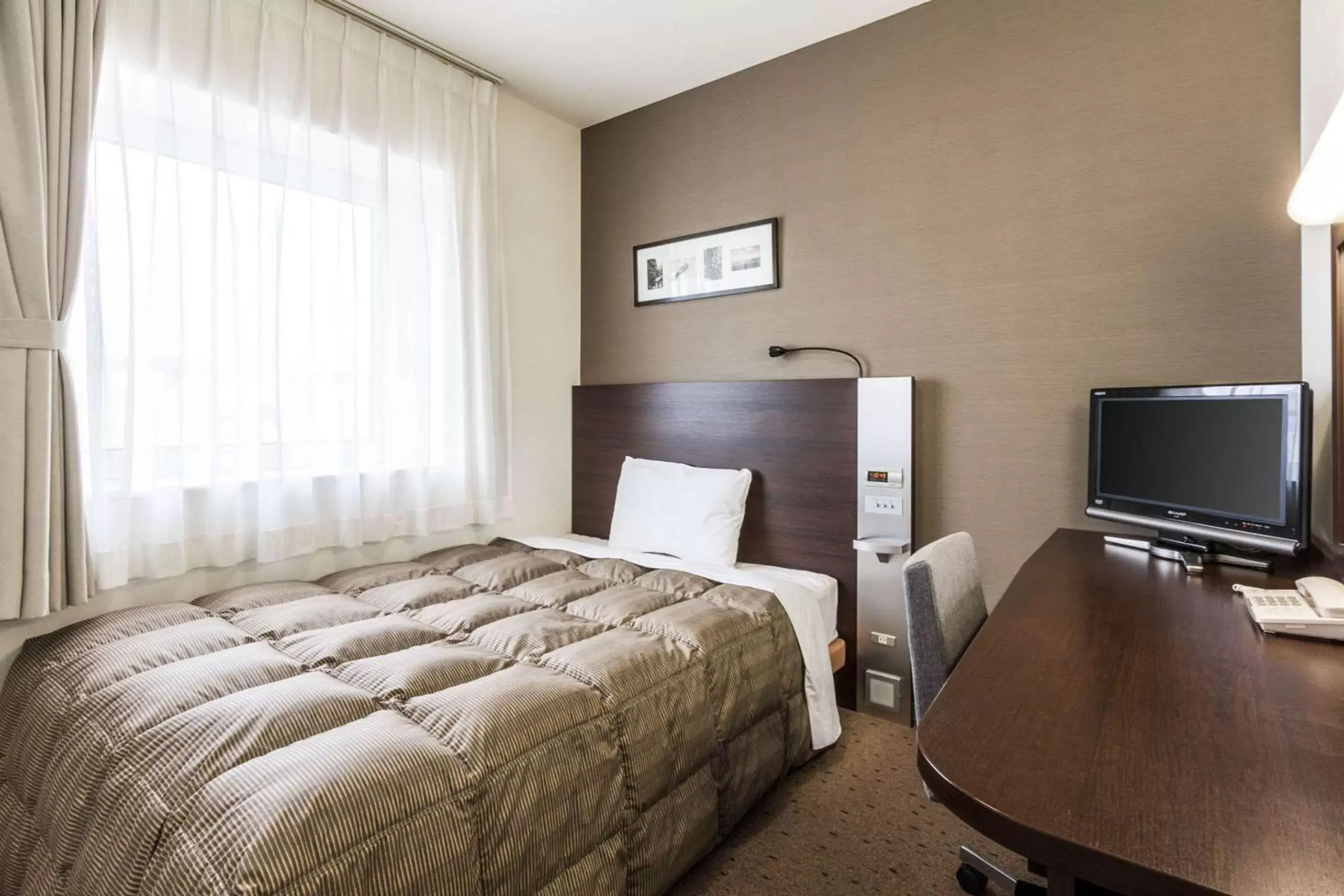 Photo of the whole room, Bed in Comfort Hotel Kitami